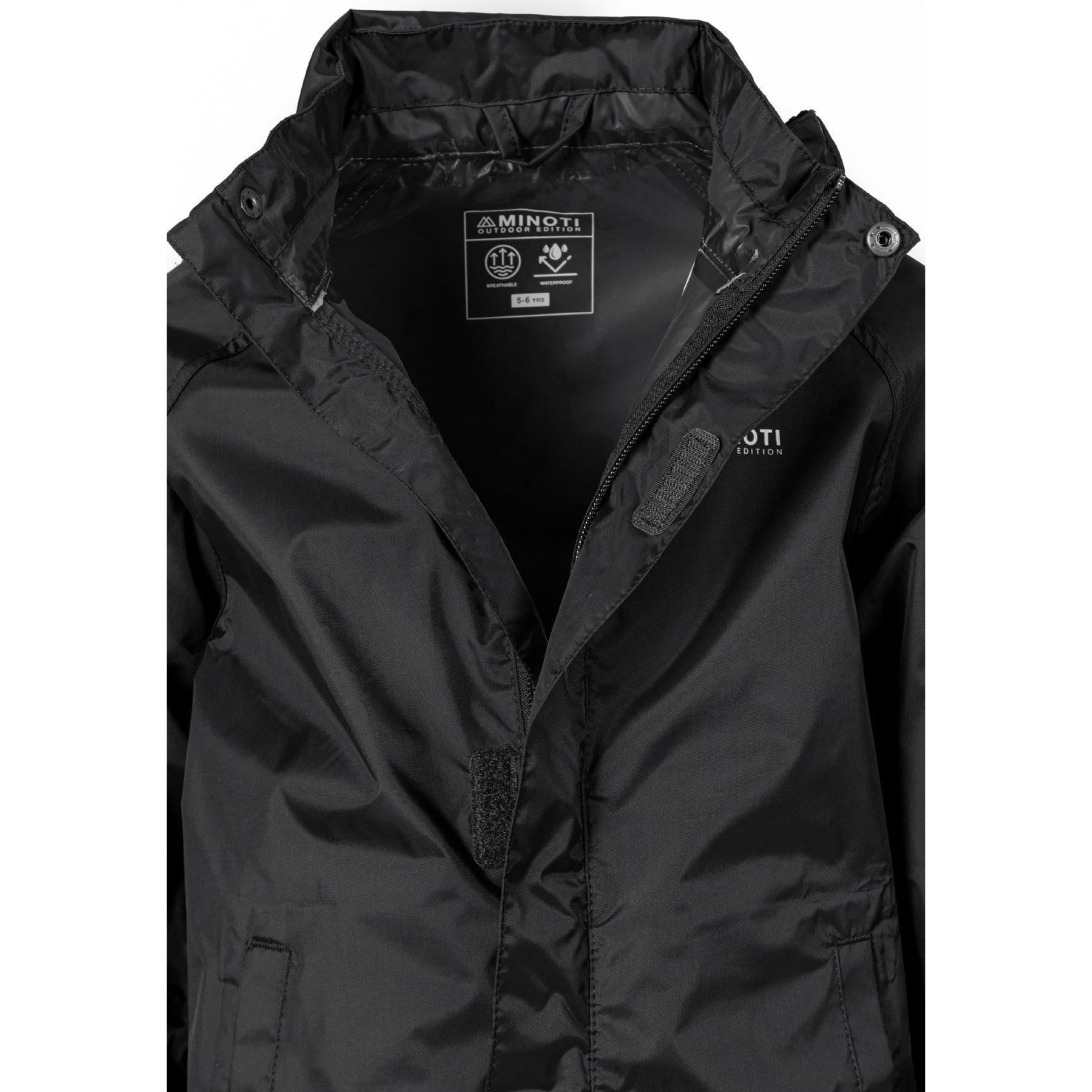 Close-up detail of black waterproof jacket showing Minoti brand label, zip closure and water-resistant fabric texture