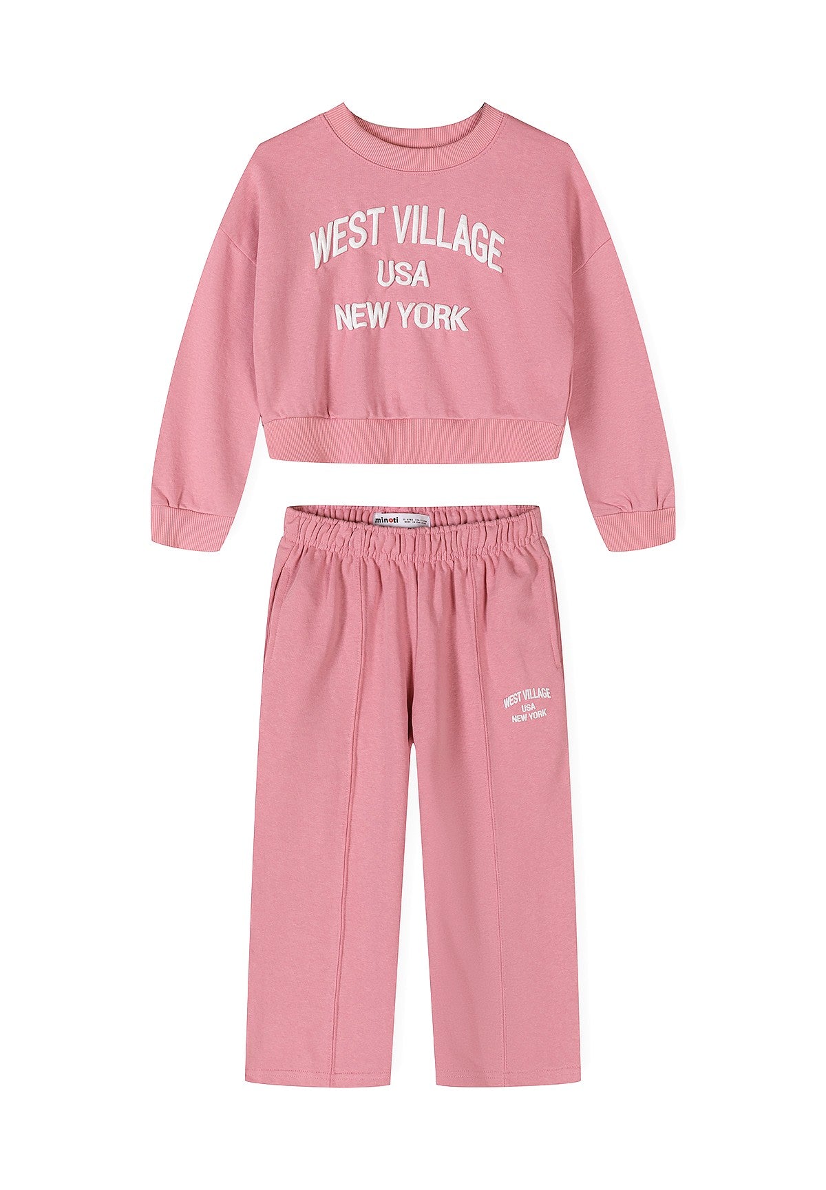 A two-piece kids' lounge set in dusty pink, featuring a cropped long-sleeve sweatshirt with 'WEST VILLAGE USA NEW YORK' printed in white on the chest, and matching wide-leg sweatpants with an elastic waistband and a small white logo on the left leg.