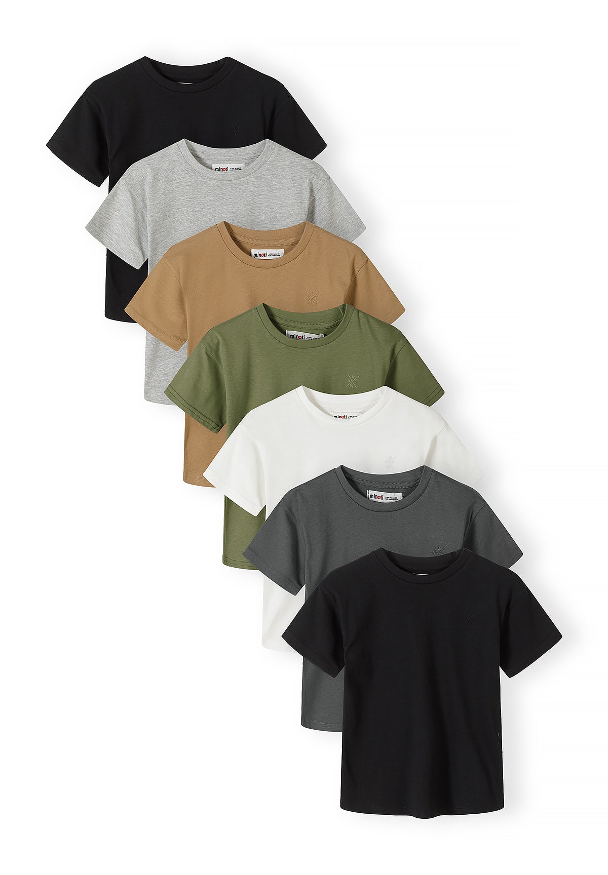 Stack of seven cotton t-shirts in neutral earth tones - black, grey, brown, green and white - arranged in an overlapping display against white background