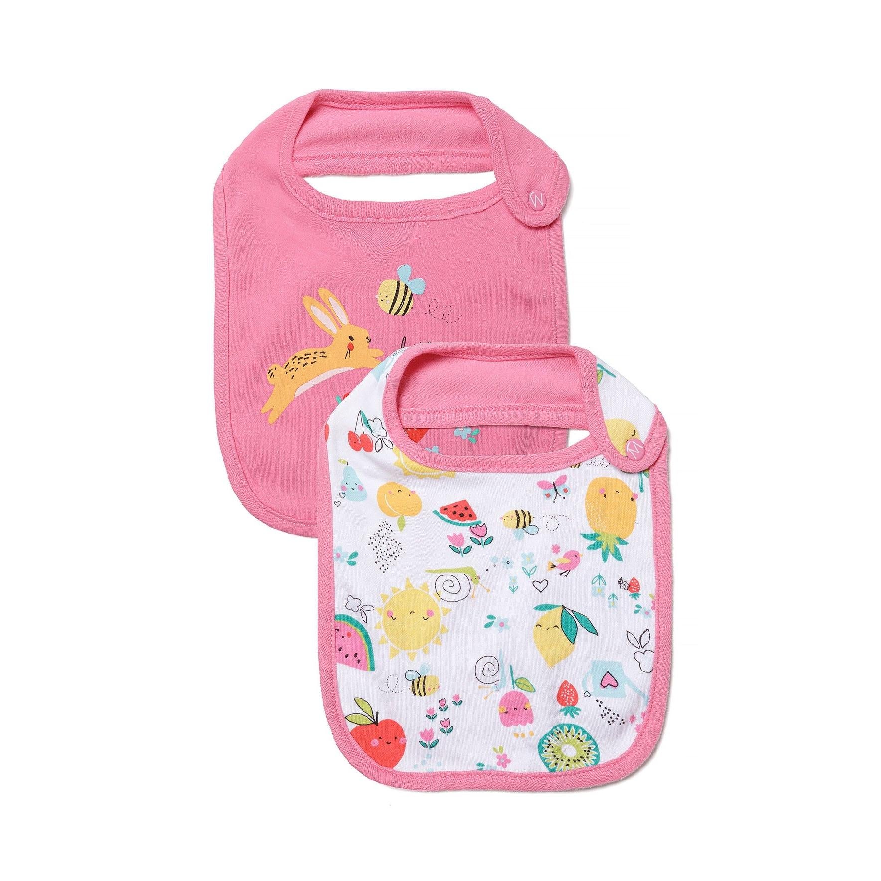 Two pink baby bibs displayed against white background, one solid pink with bunny design, one white with colorful fruit and character pattern