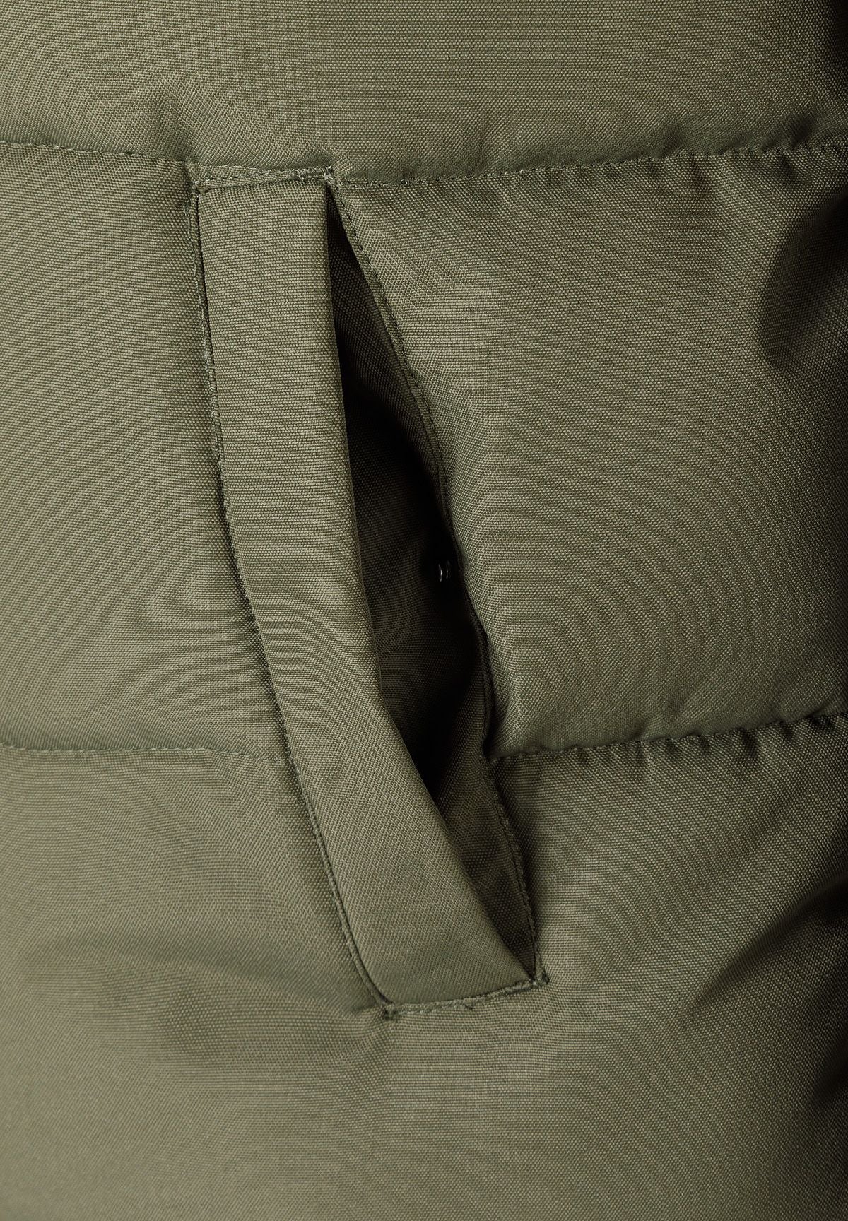 Detail of a khaki men's padded jacket showing a zip pocket.
