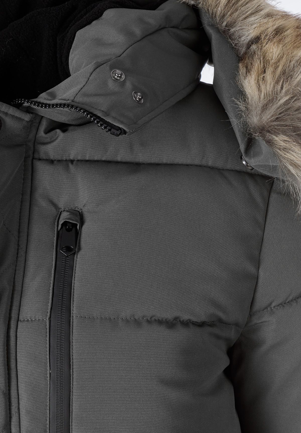 Close-up of a grey padded men's jacket featuring a faux fur trim hood and a zip chest pocket.