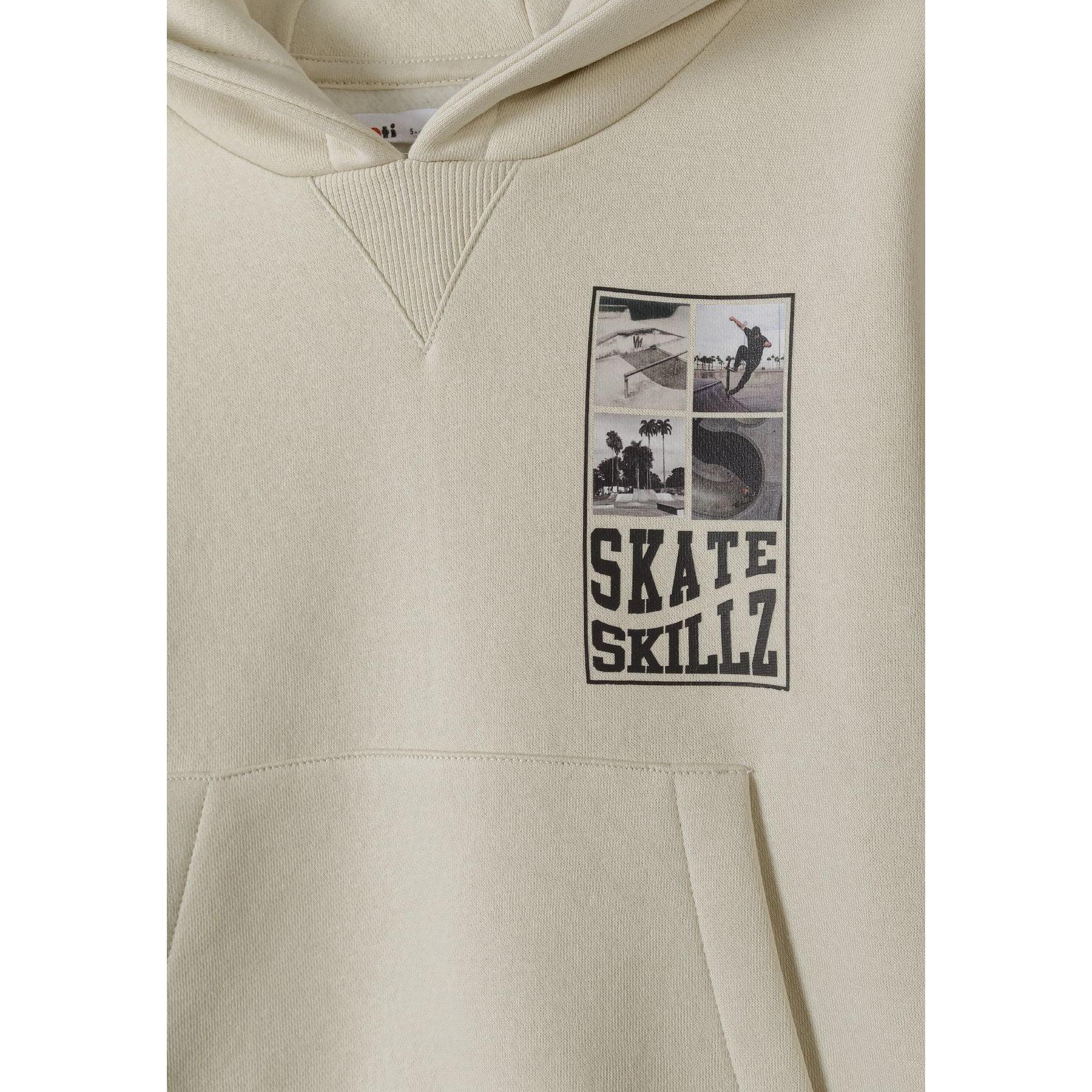 Close-up of Skate Skillz photo collage print and kangaroo pocket on stone hoodie