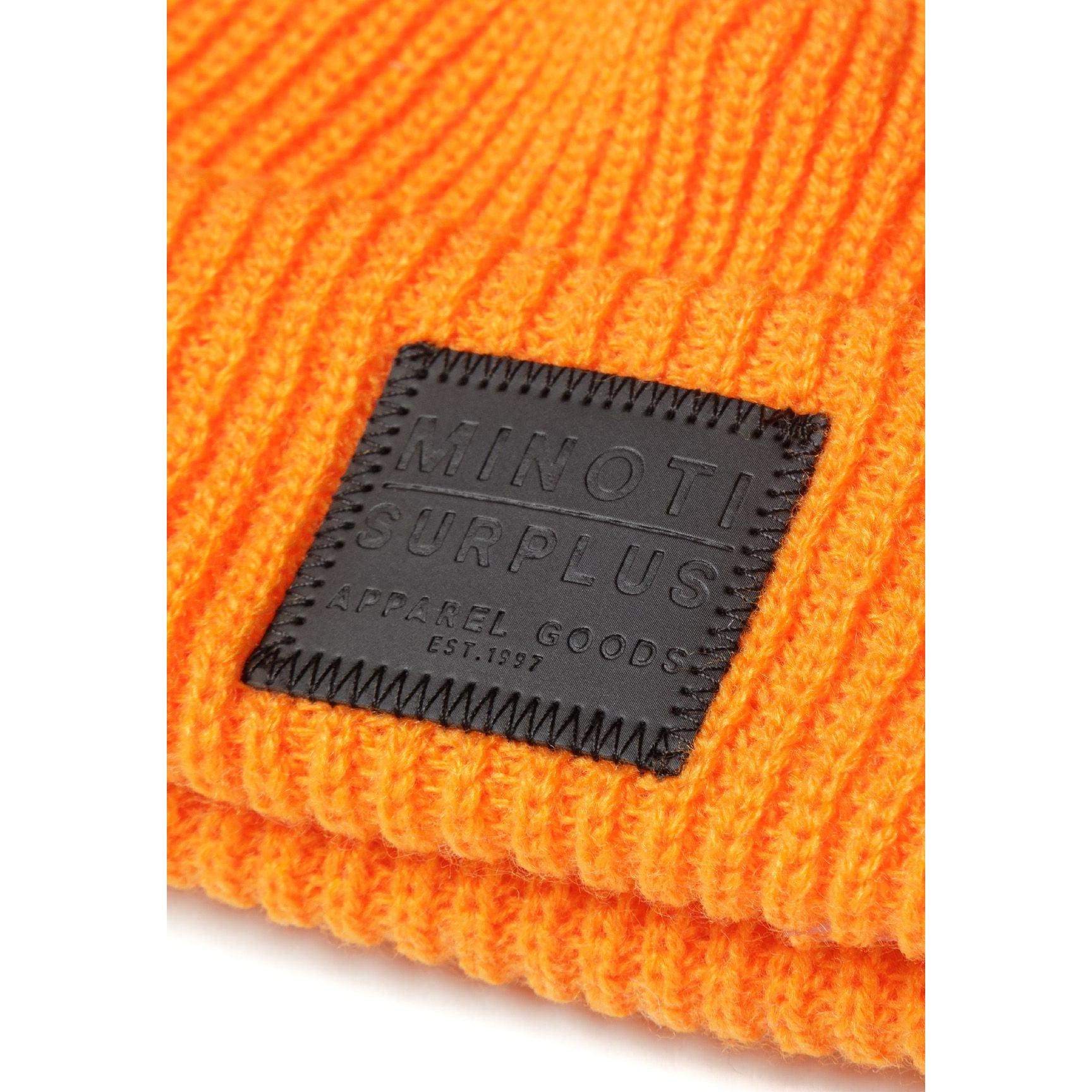 Side angle close-up of light grey ribbed beanie showing knit texture and folded cuff detail on white background