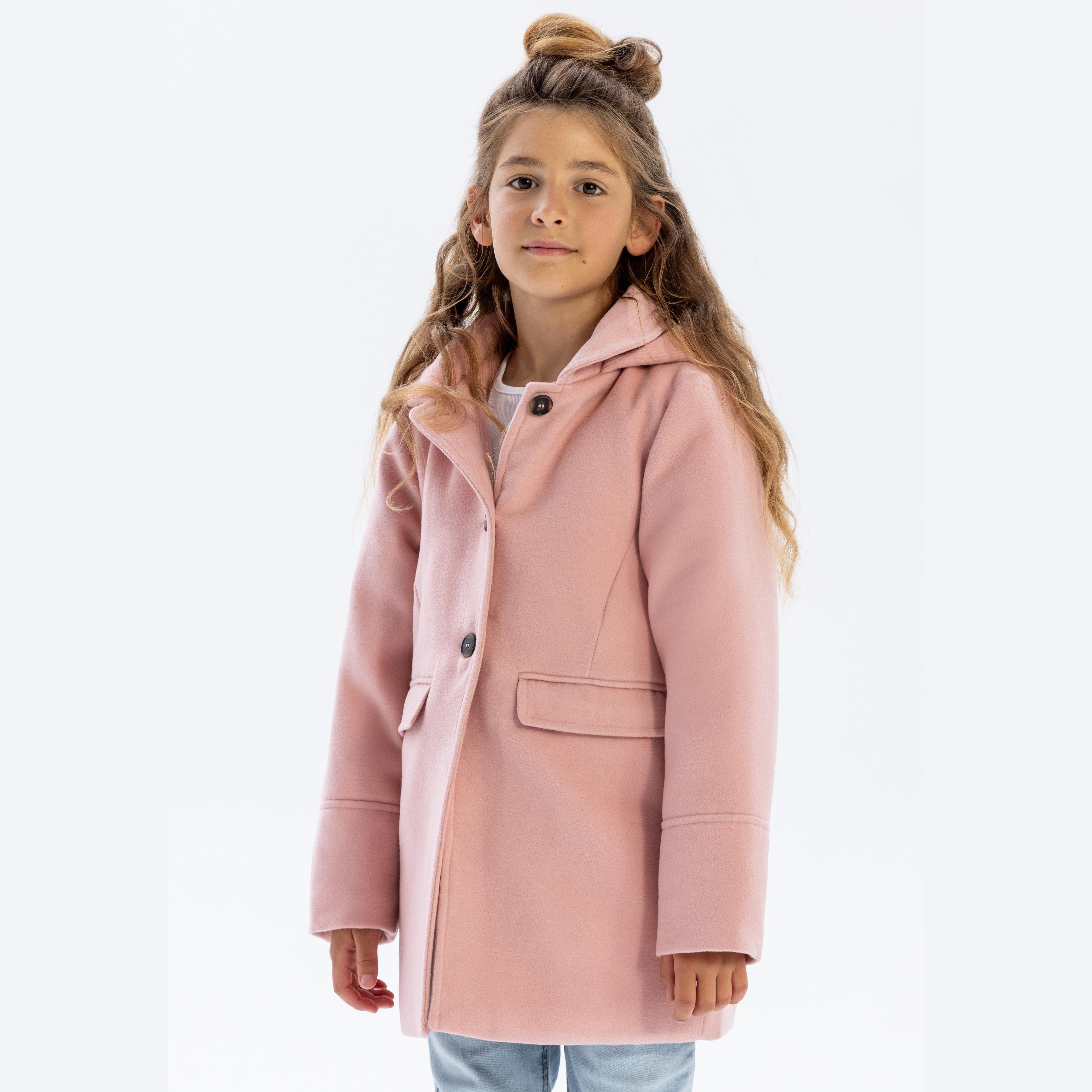Young girl wearing pink hooded padded coat with button fastening, standing against white background, front view showing classic winter coat design
