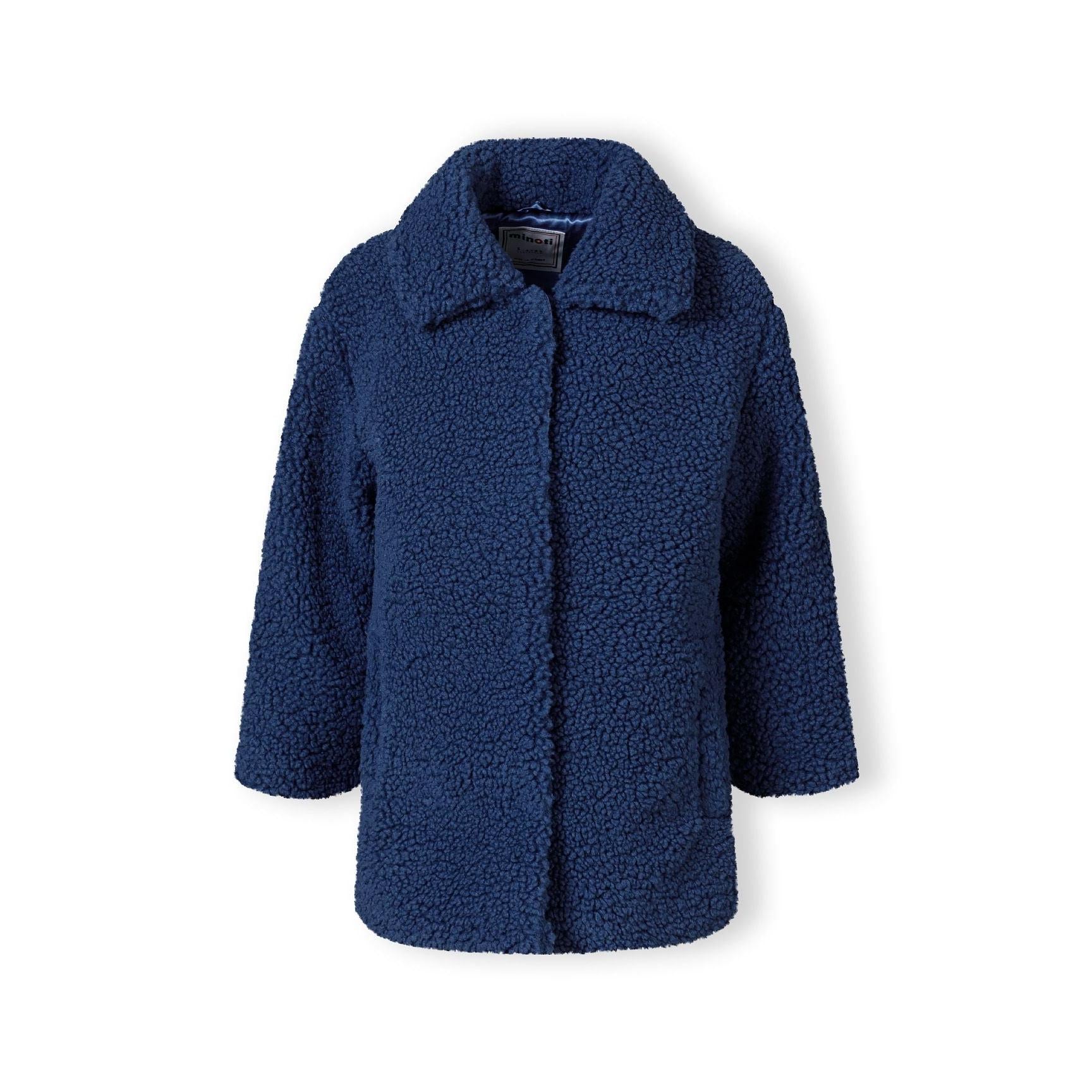 Back view of navy boucle coat showing textured fabric surface and collar detail on white background