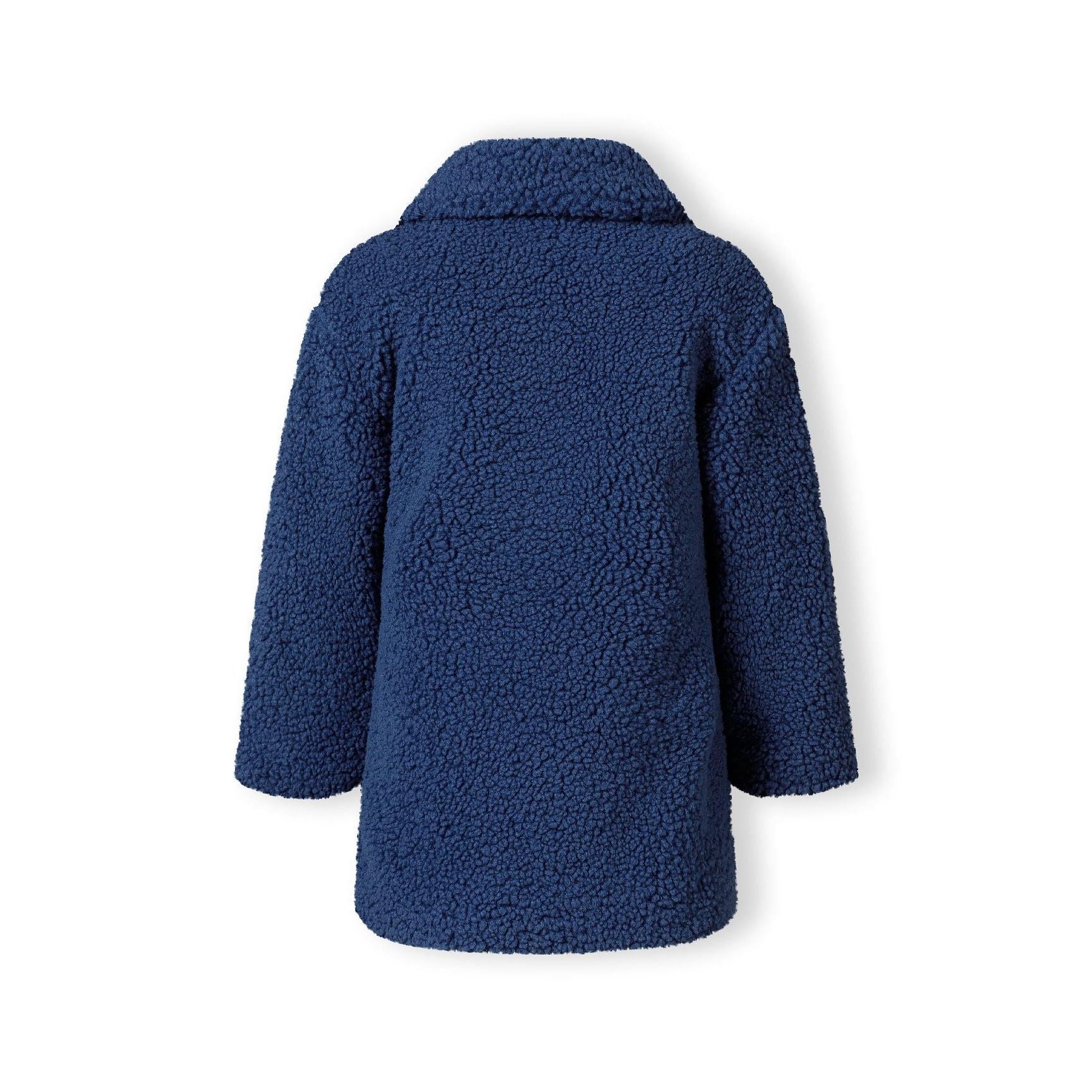 Back view of navy boucle coat showing textured fabric surface and collar detail on white background