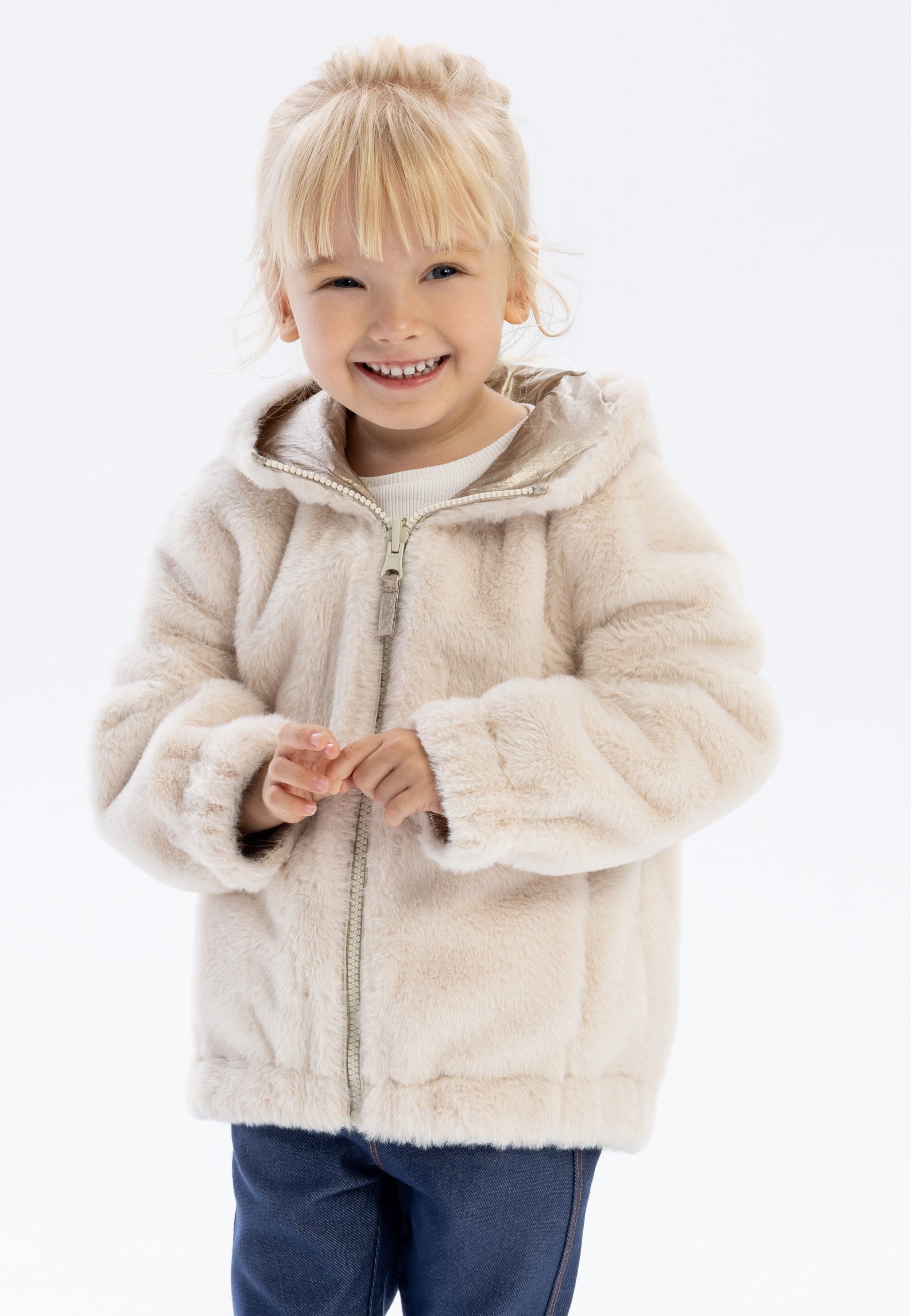 Girls reversible beige jacket with plush teddy fur, front view, featuring a full-length zipper and hood.