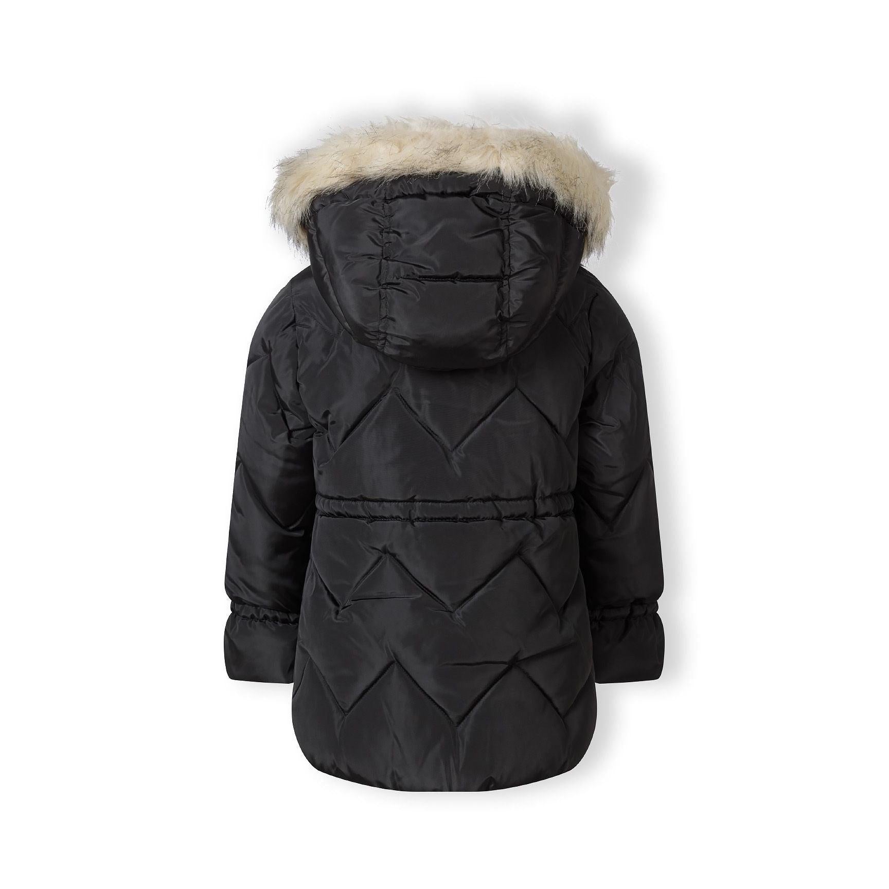Close-up detail of black quilted parka showing faux fur hood trim, snap button closures and diamond quilting pattern texture