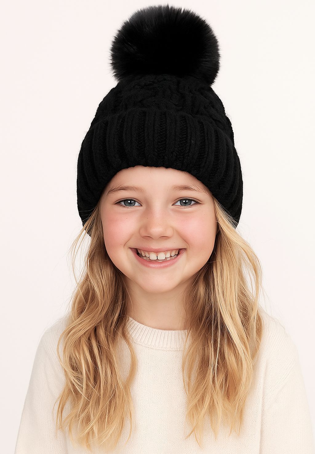 Black cable-knit bobble hat, model front.