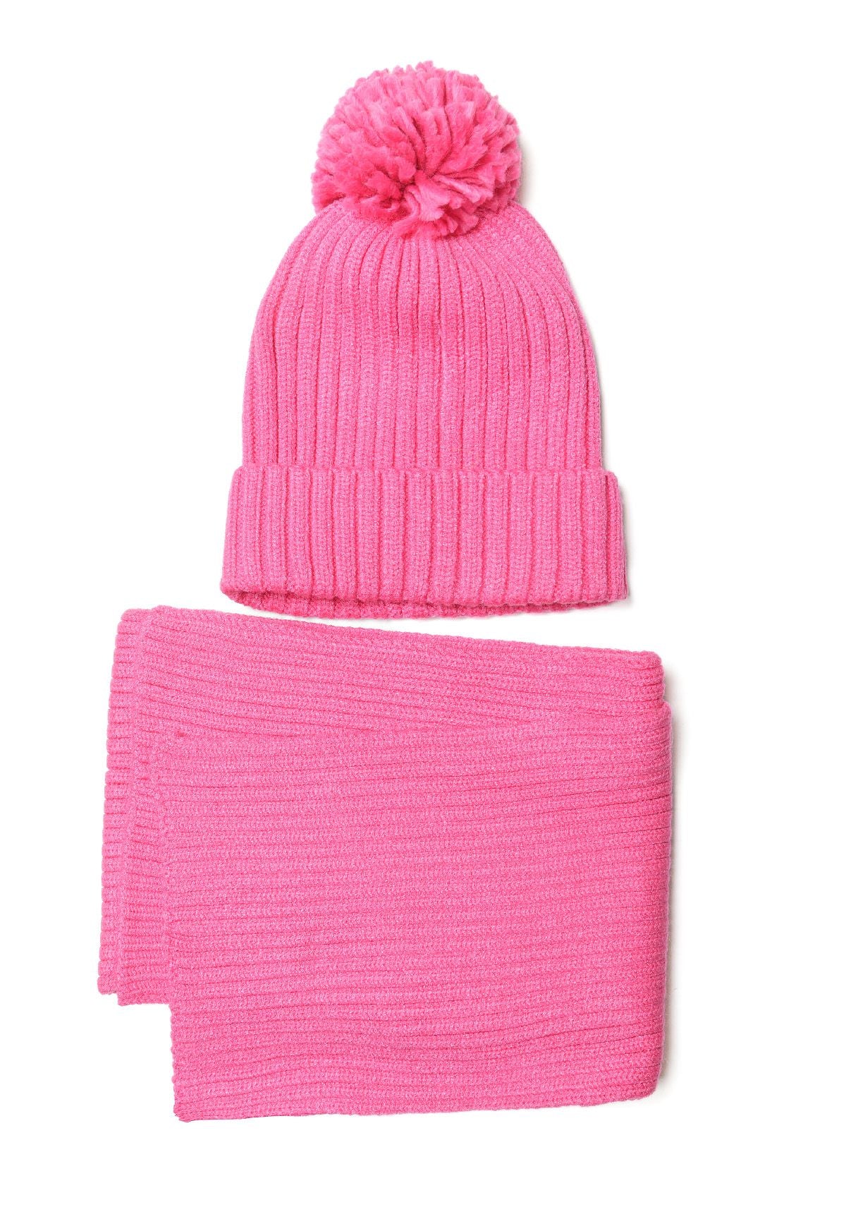 Girls pink knitted hat with pom pom and matching scarf, front view.