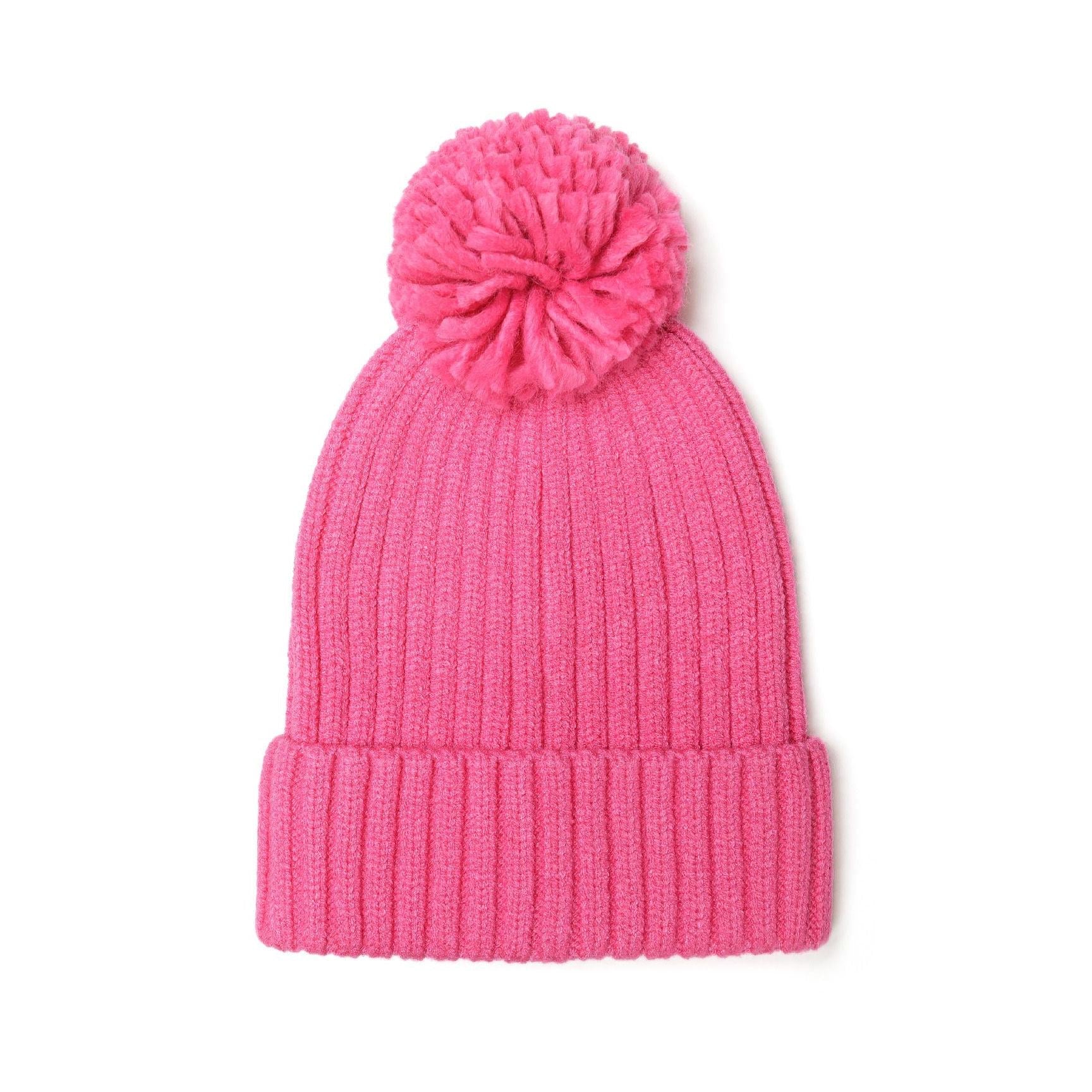 Close-up texture detail of pink ribbed knit scarf showing soft fabric weave and ribbed pattern