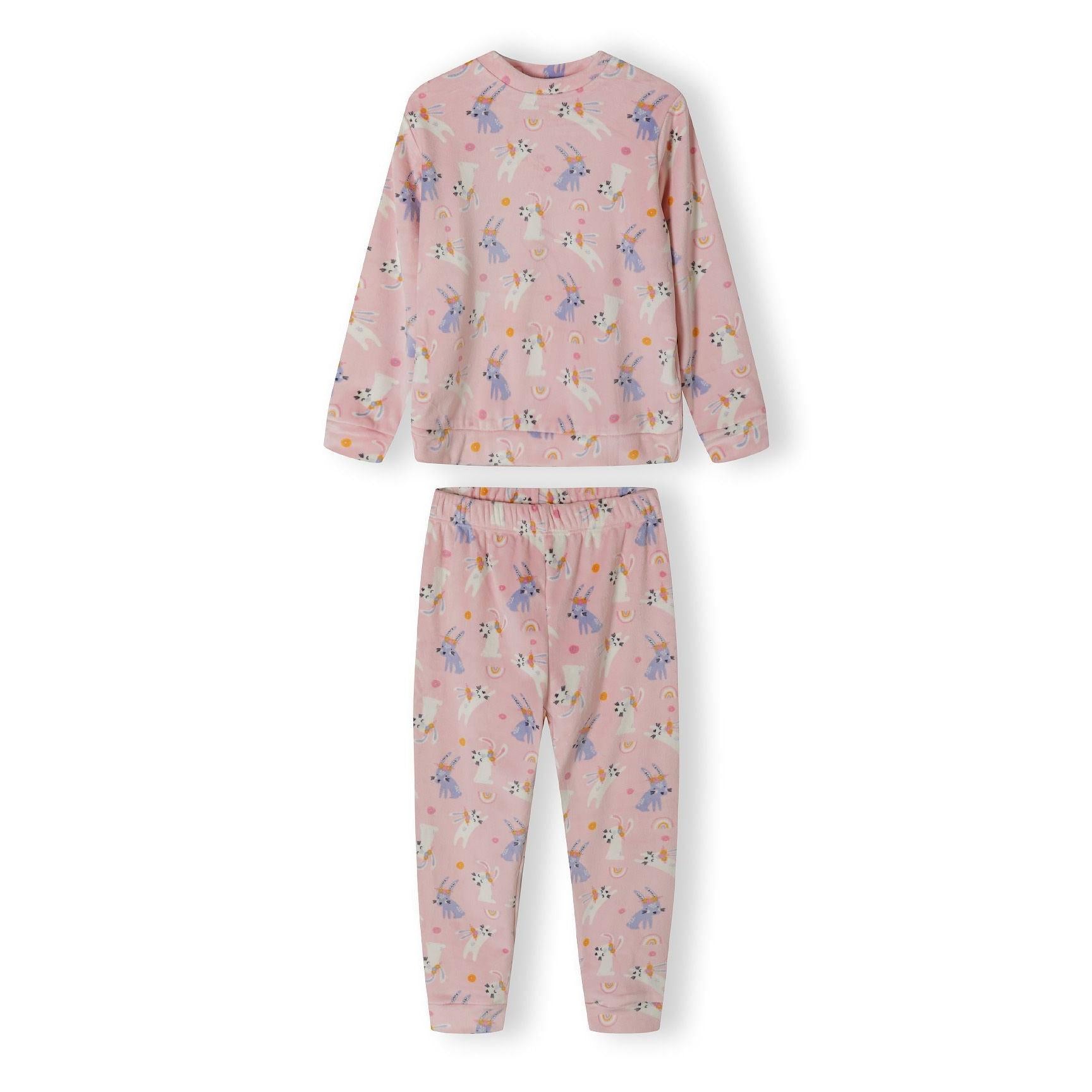 Pink velour pyjama top laid flat showing unicorn pattern and long sleeves on white background
