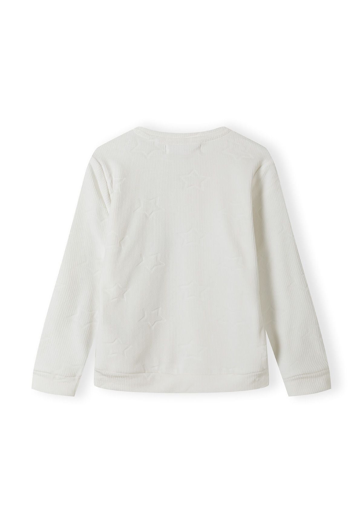 Back view of a cream long sleeve girls pyjama top with ribbed cuffs and star pattern.