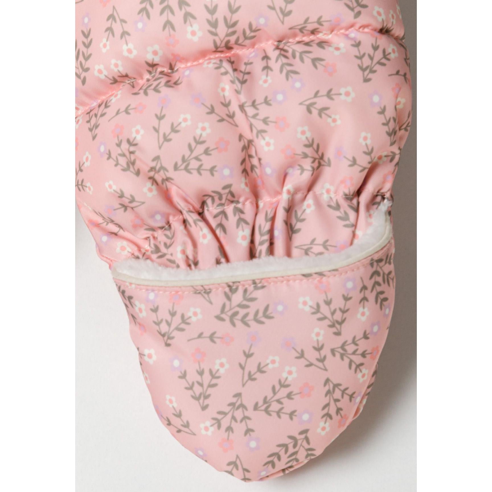 Detail shot of baby snowsuit booties showing floral print pattern and quilted construction with white trim on neutral background