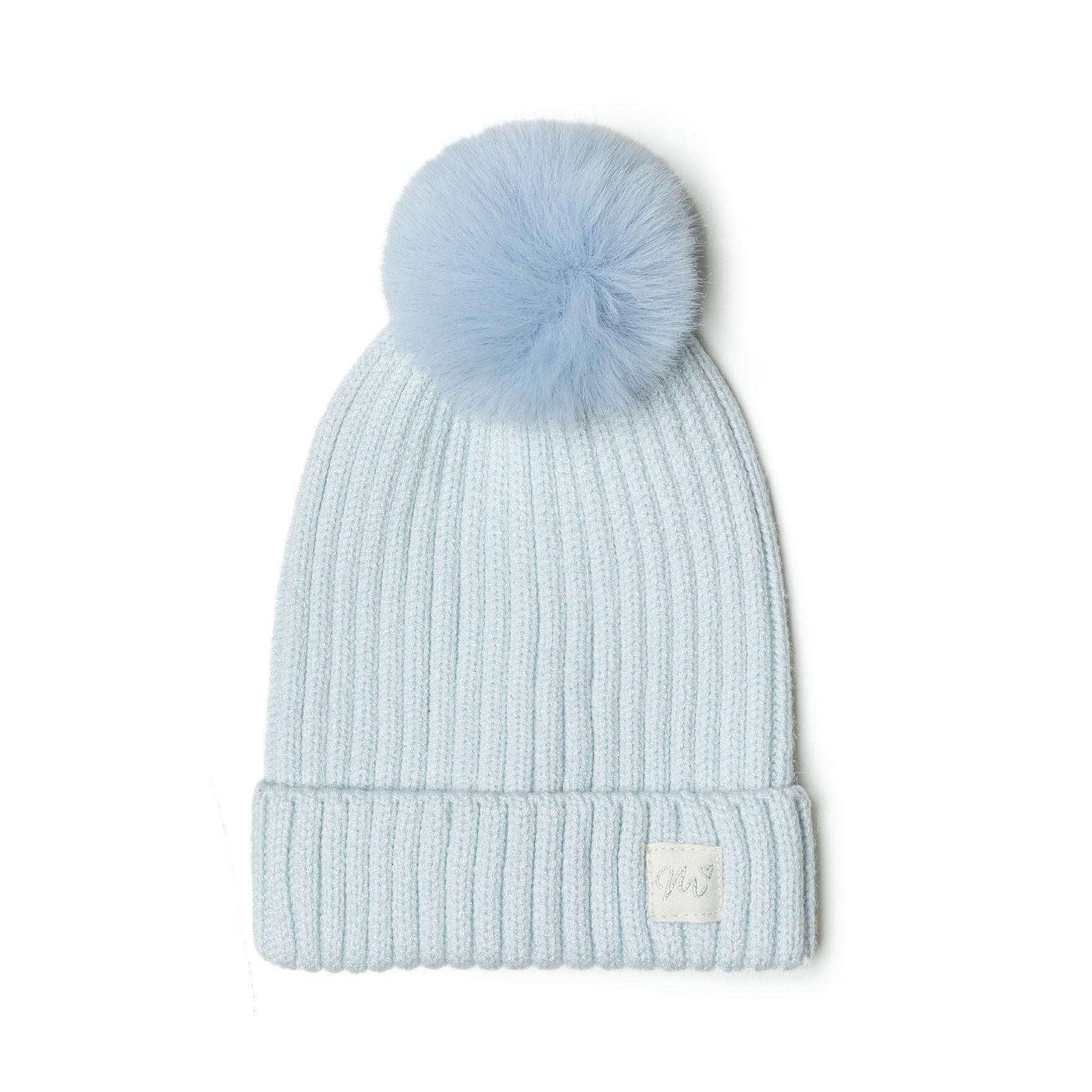 Light blue ribbed baby beanie with fluffy pom pom and white lurex badge on white background