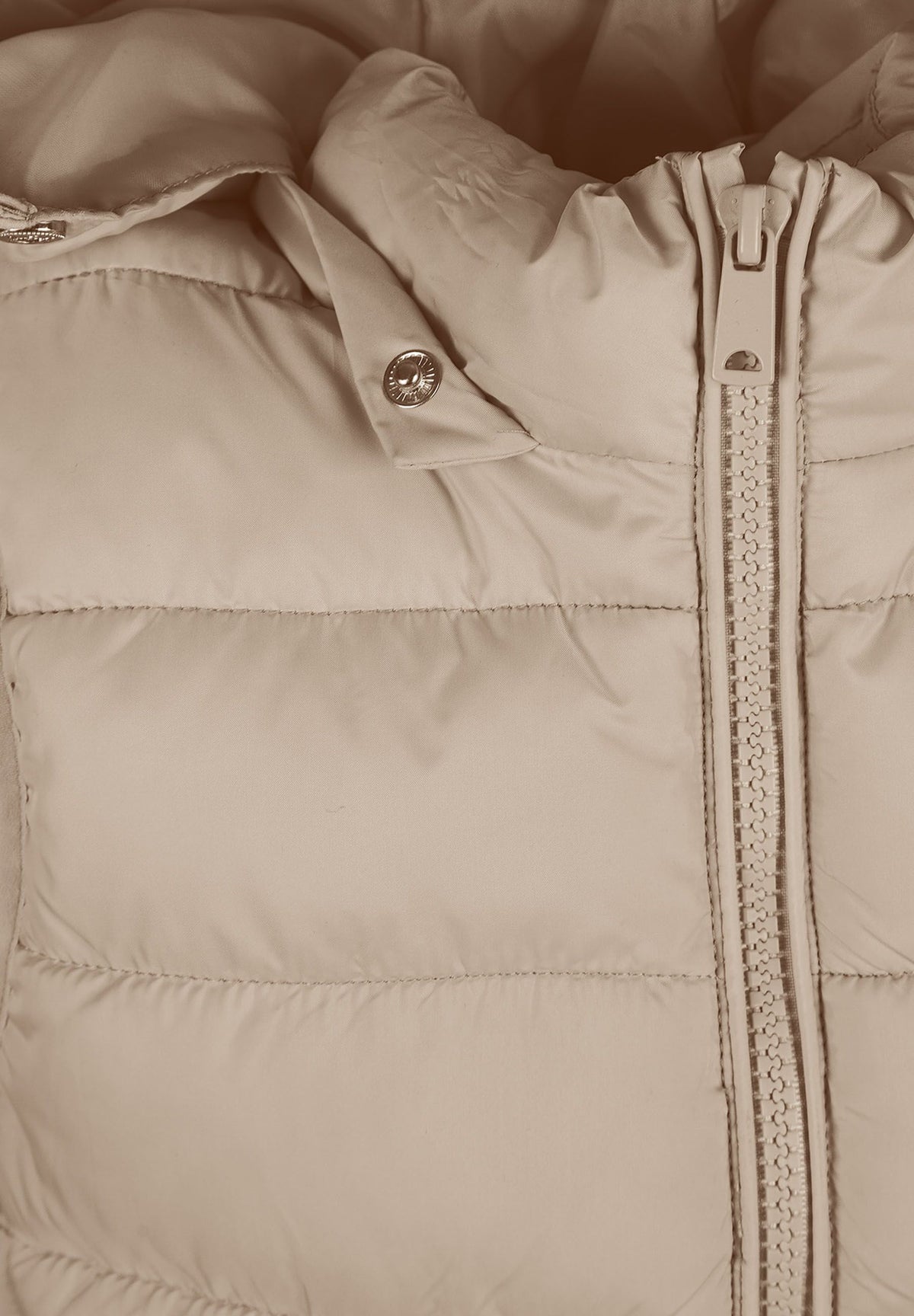 Beige padded gilet, hood attachment detail.