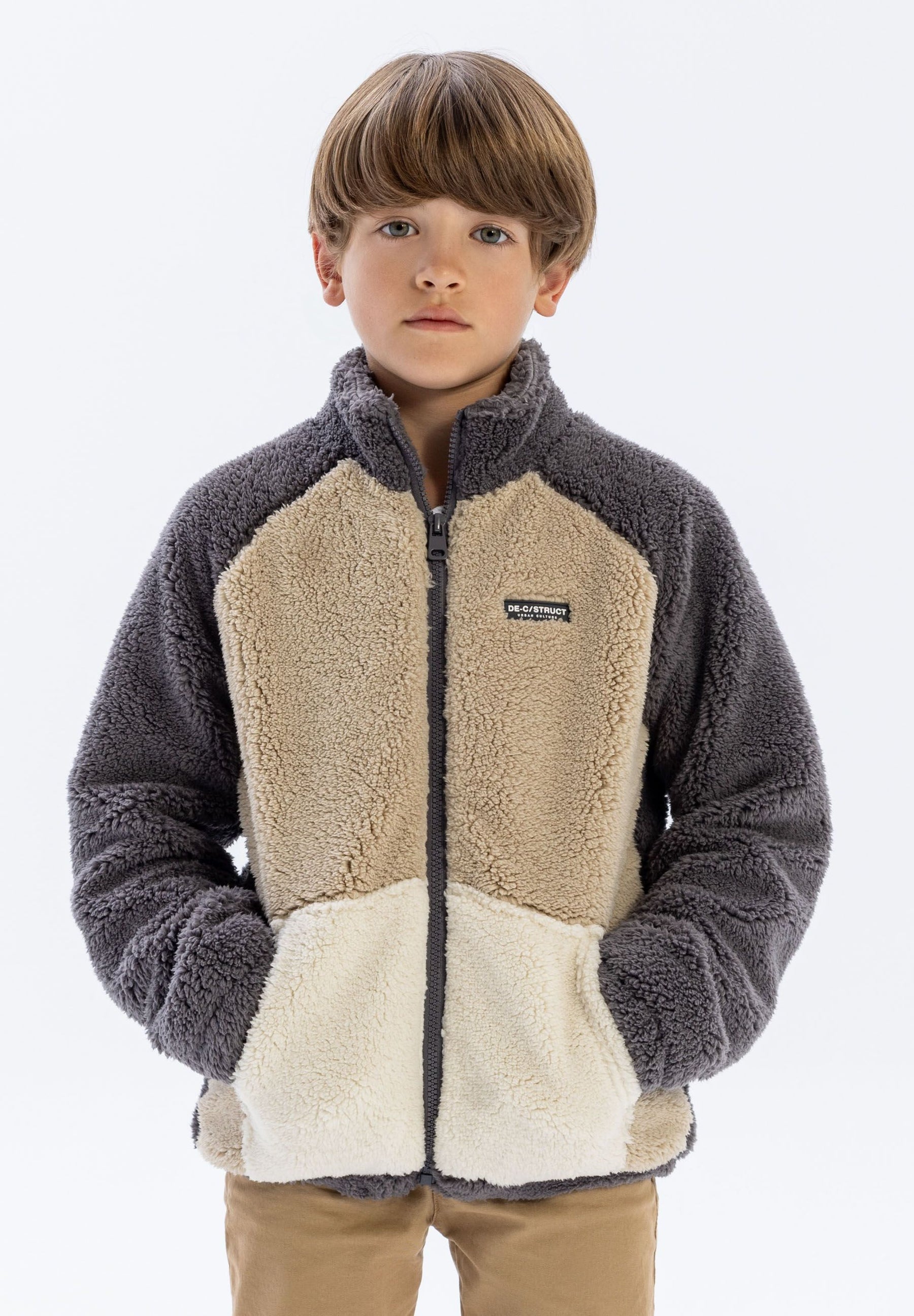 Boys sherpa fleece jacket in brown with cream pocket, front view.