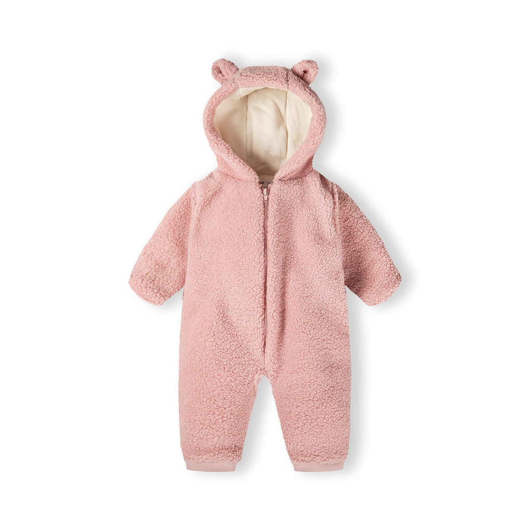 Light pink sherpa snowsuit with bear ears hood displayed on white background, showing full front view of baby onesie with zip closure