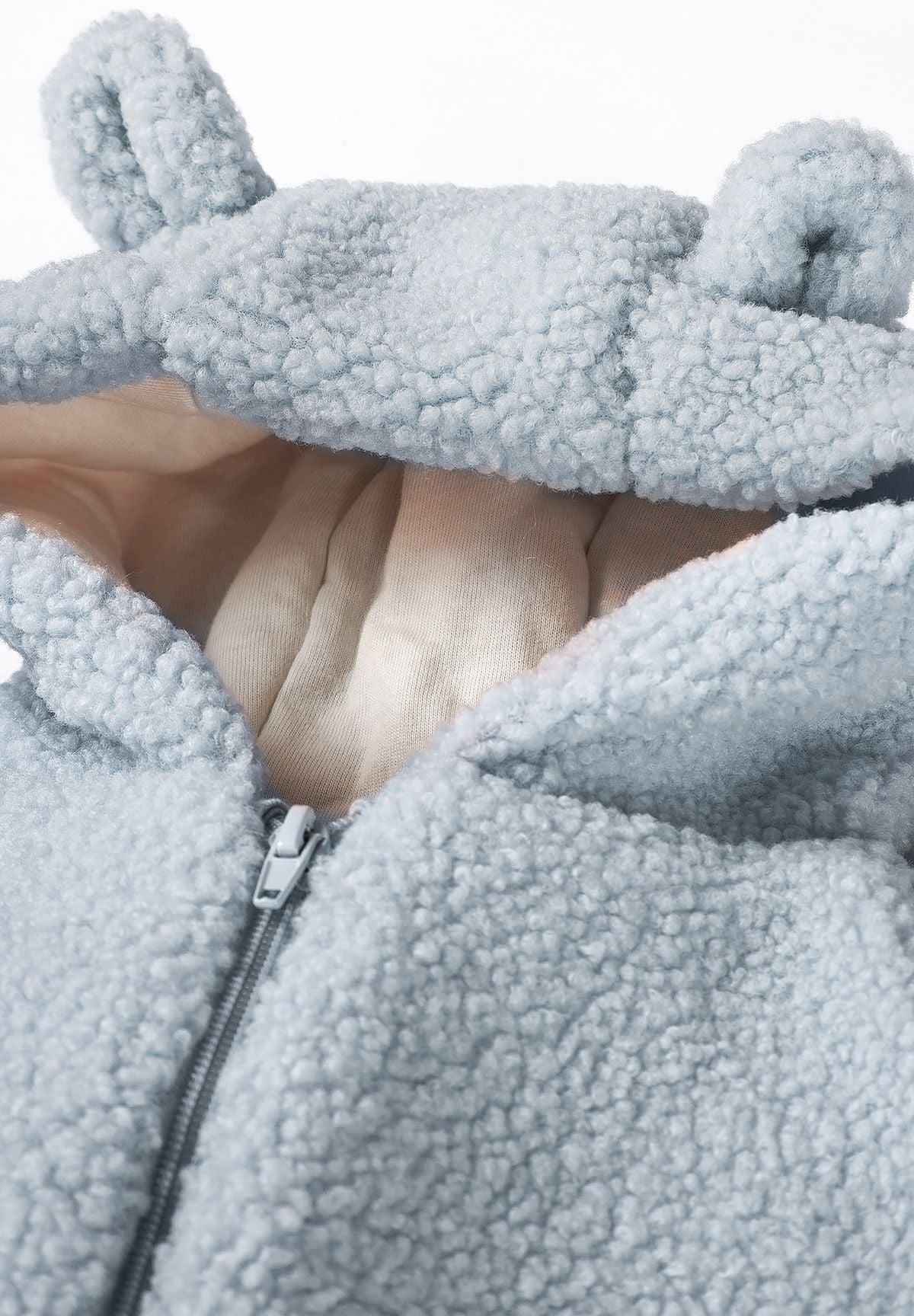 Light blue teddy pramsuit, hood ears detail.