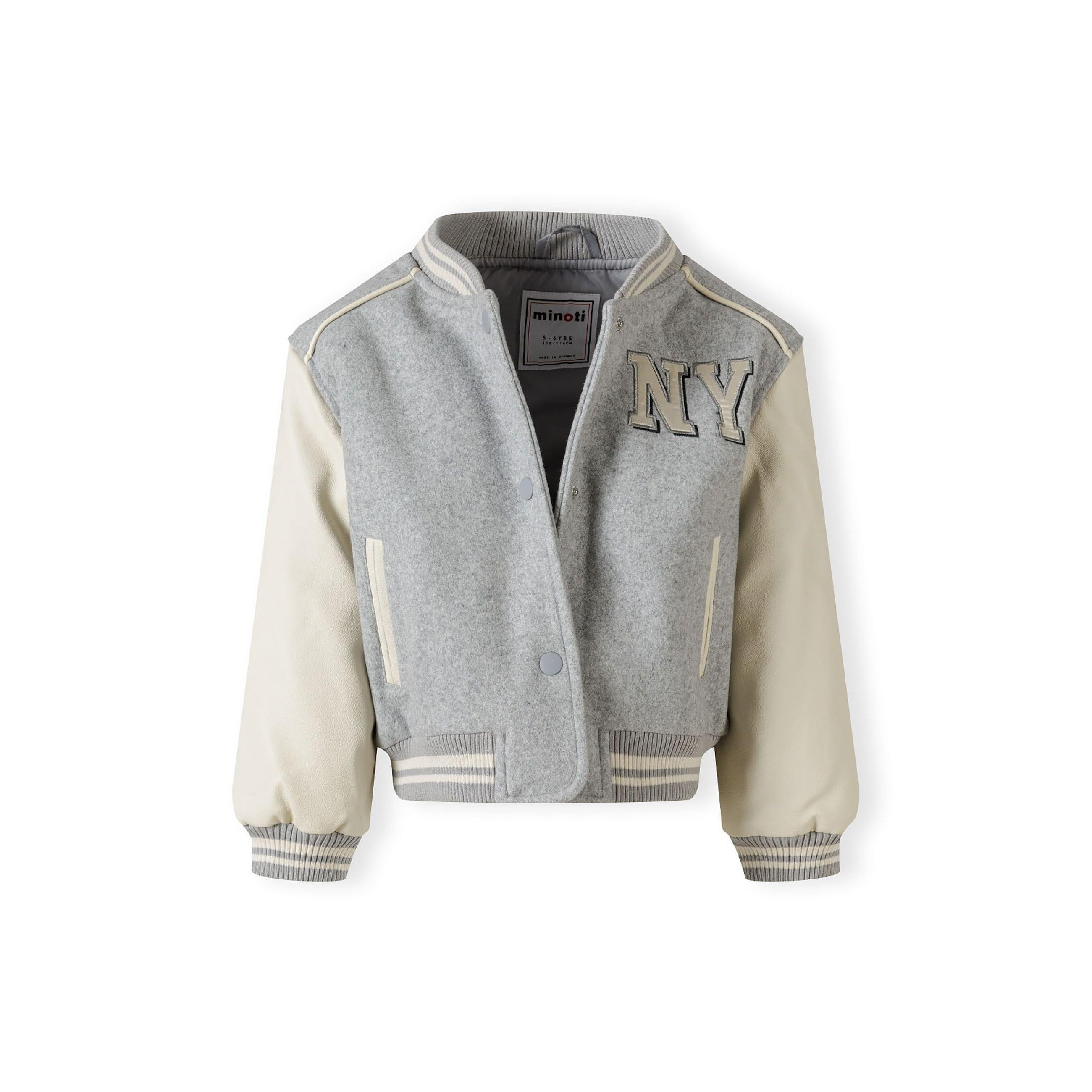 Close-up detail of grey baseball jacket showing side pocket with cream piping trim against the melange fabric texture