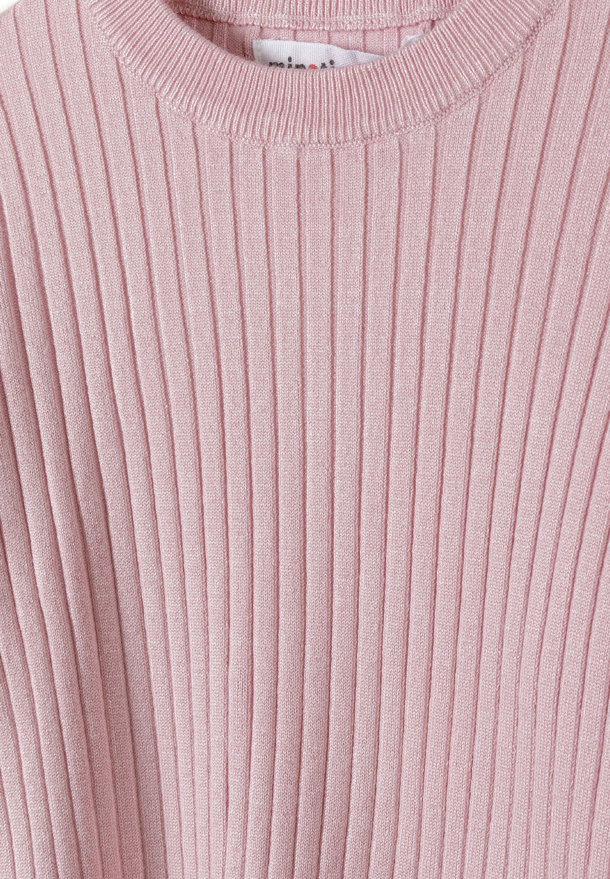 Close-up of the pink jumper's narrow rib knit and round neckline.
