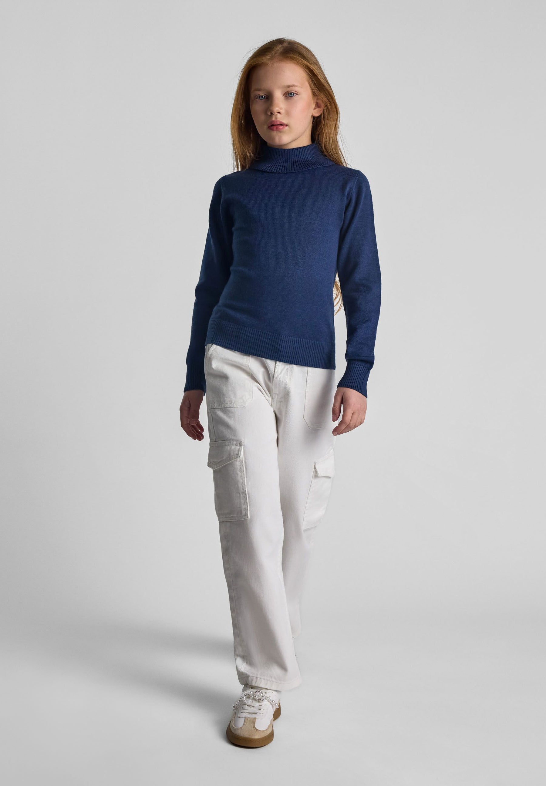 Girls navy turtleneck jumper, front view, featuring ribbed cuffs and hem.