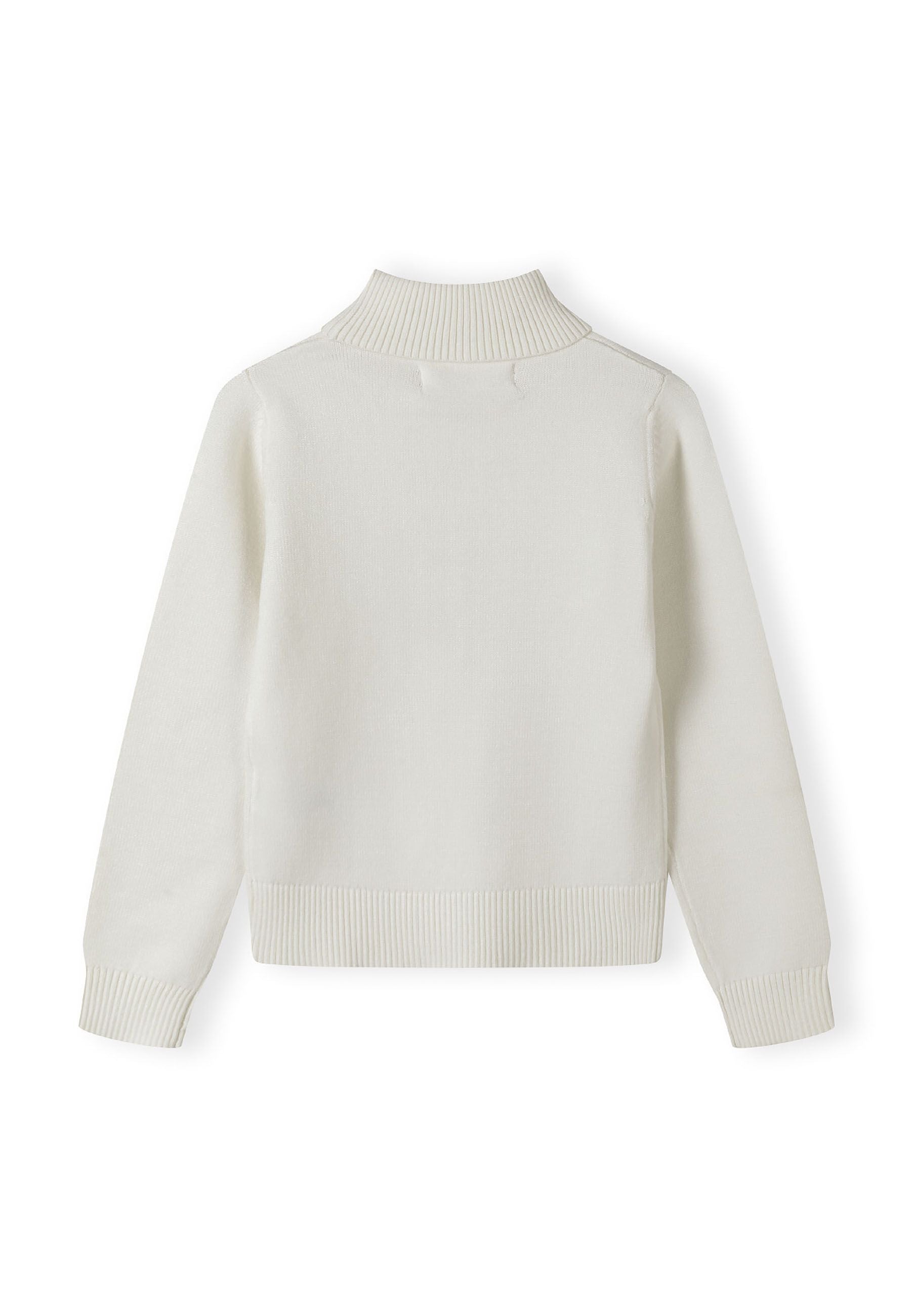 Girls cream jumper, back view, featuring a fold-over turtleneck and ribbed cuffs.