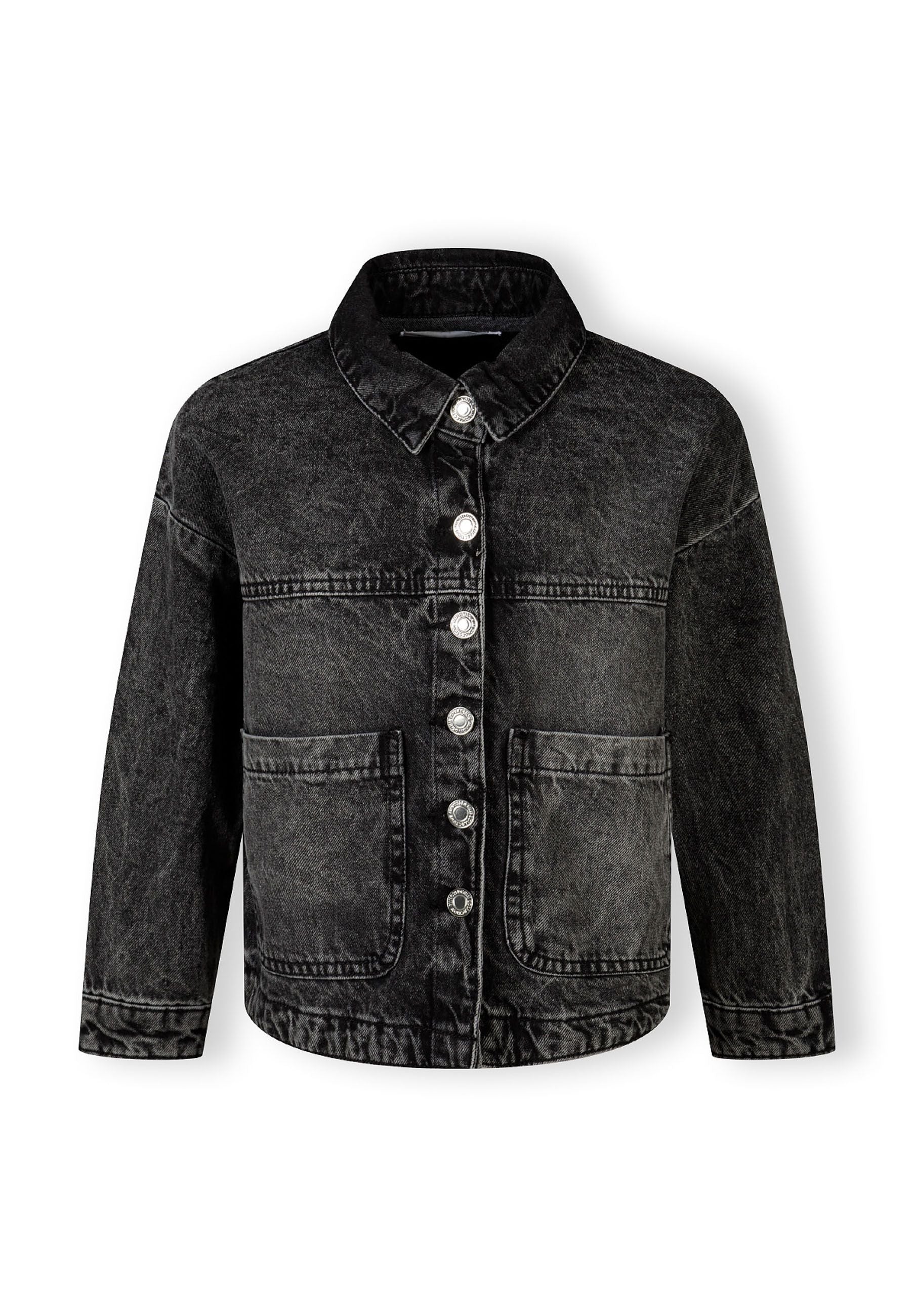 Girls black denim jacket, front view, features button closure and two front pockets.