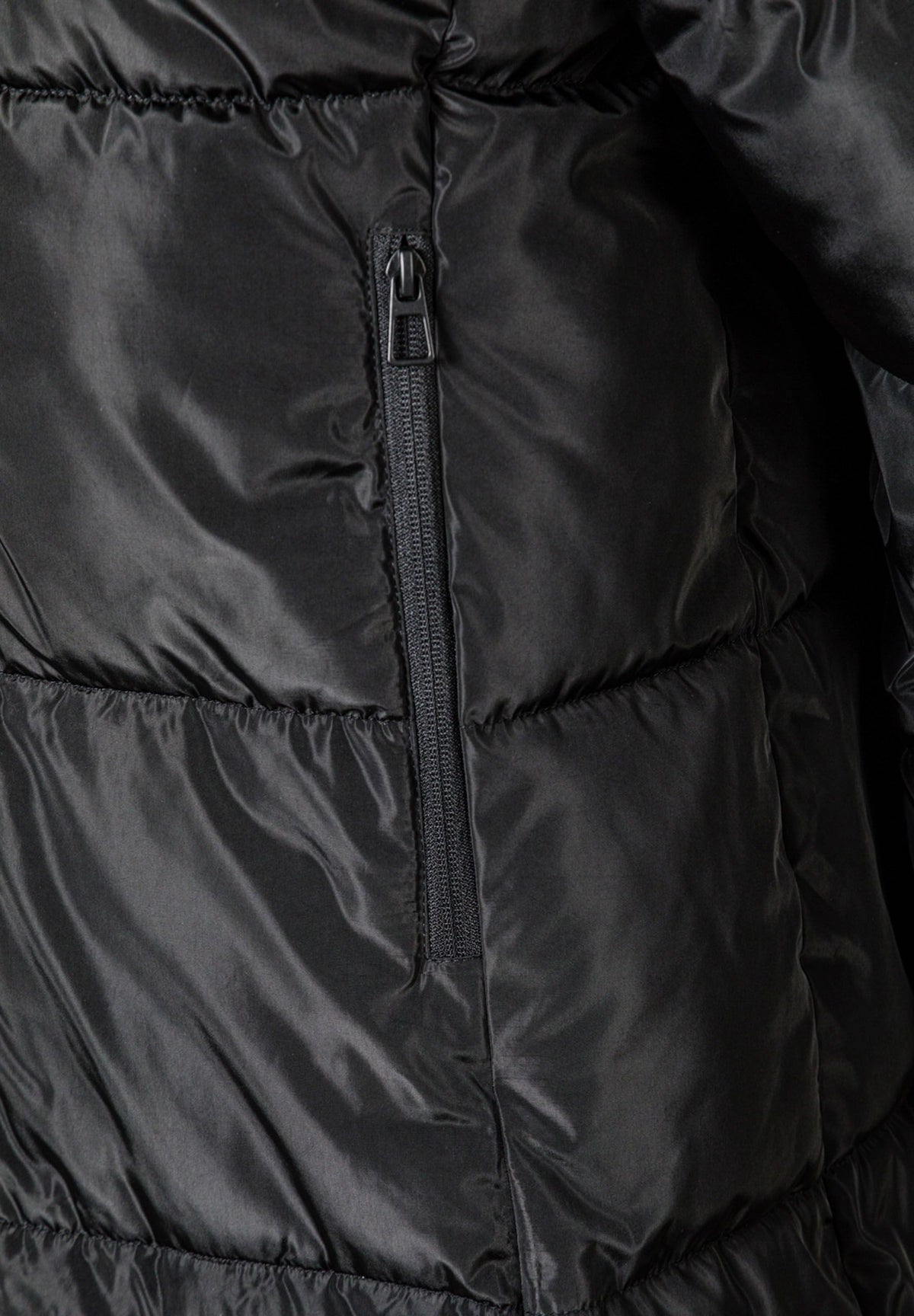 Close-up of the pocket on the black long puffer coat.