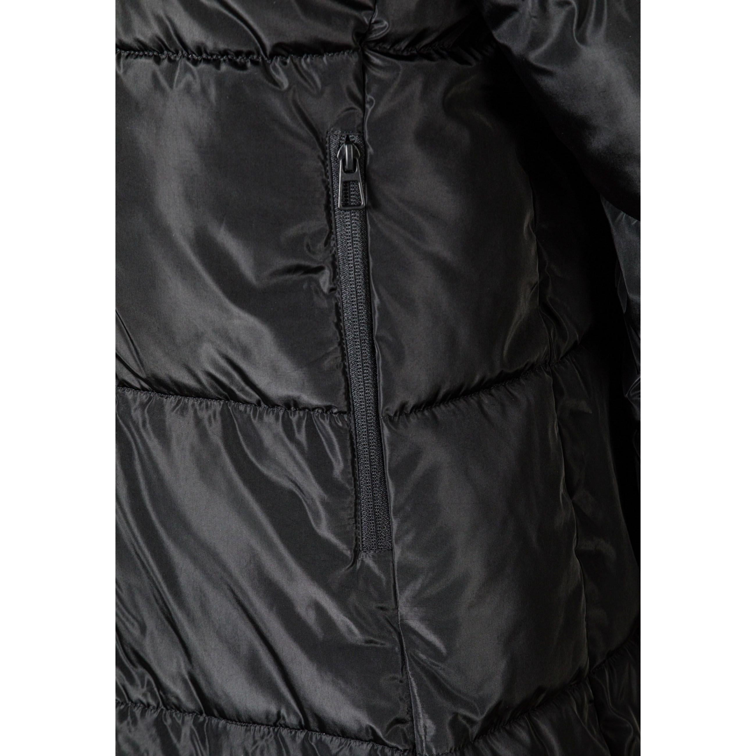 Close-up detail of black quilted jacket showing zip closure, quilted padding texture and drawstring hood cord