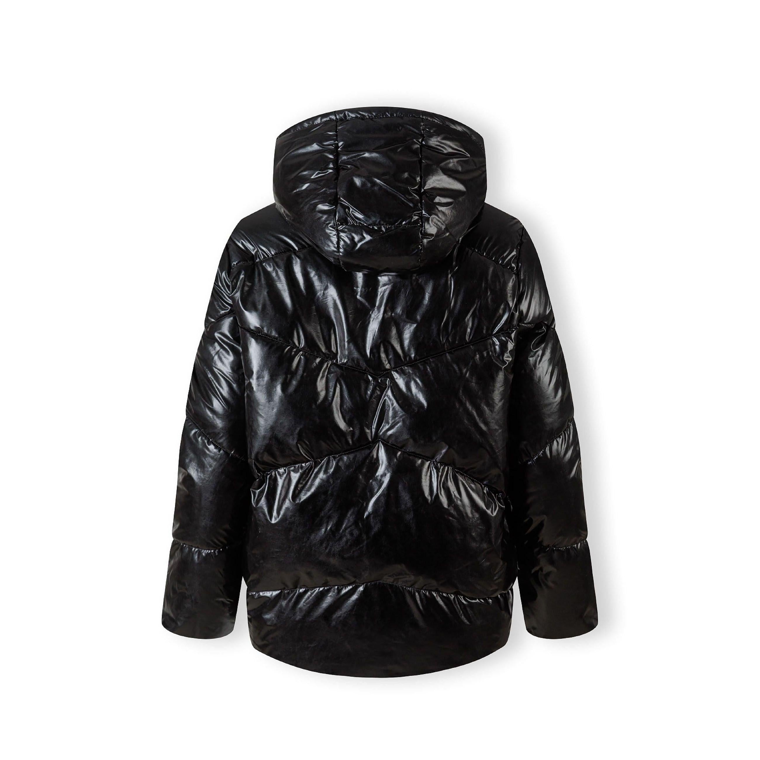 Black padded jacket laid flat showing back view with quilted pattern and hood