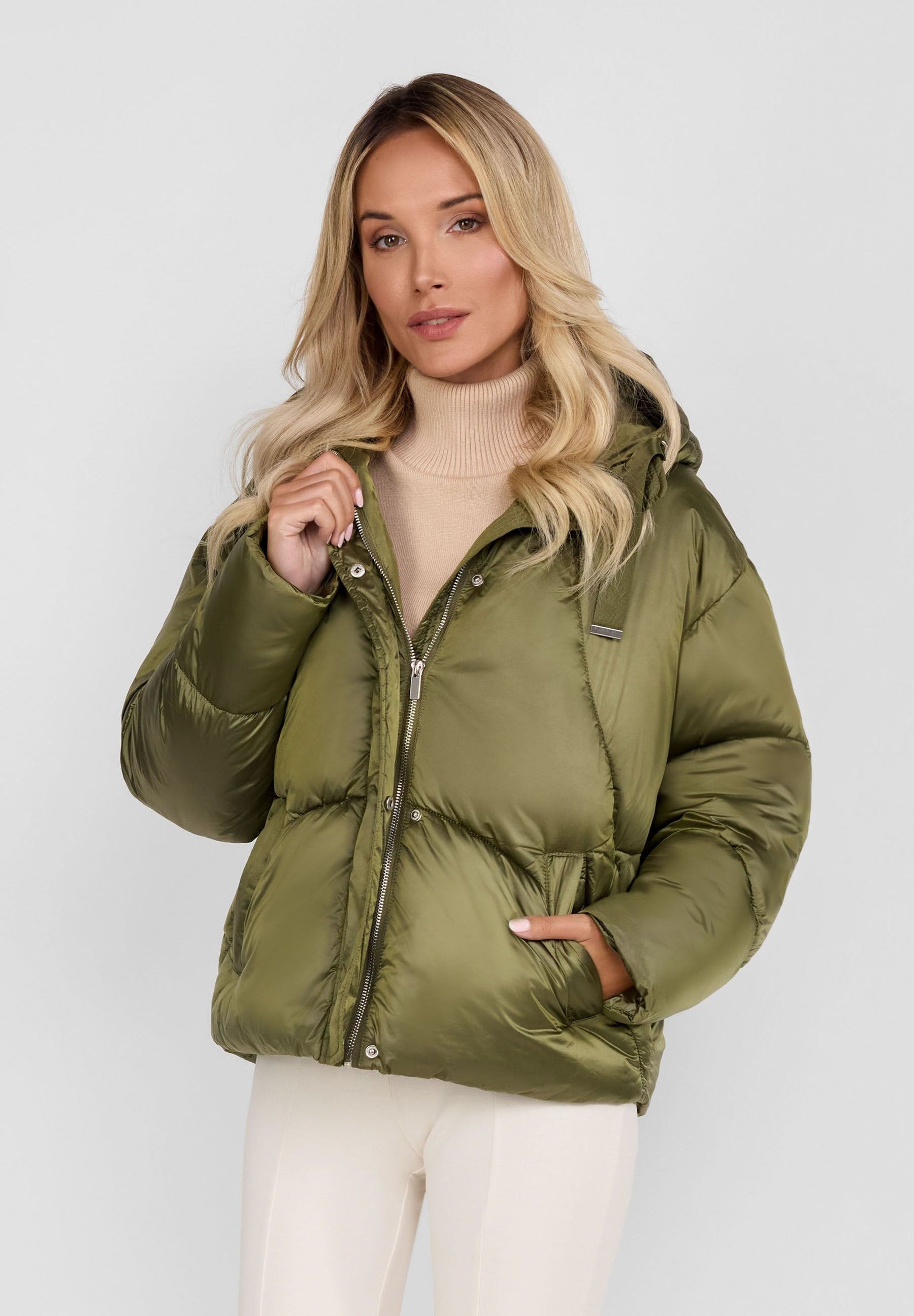 Women’s olive padded hooded jacket, front view with two side pockets.