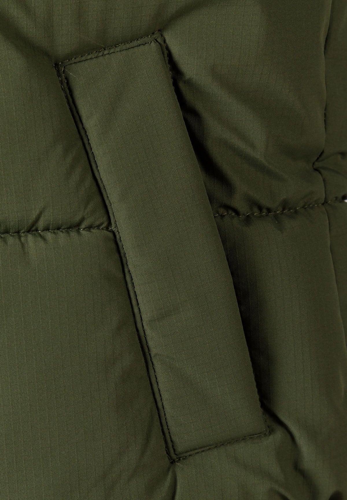 Boys' ripstop padded gilet with hood in khaki, close-up of the vertical welt pocket