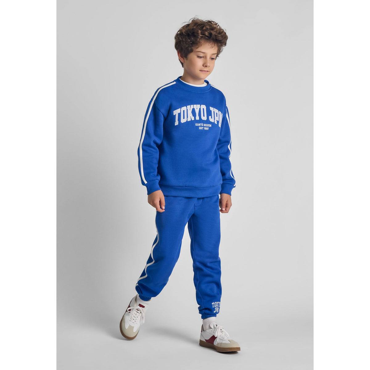 Boys' sweatshirt and joggers set in blue and cream — complete product view for square Shop card