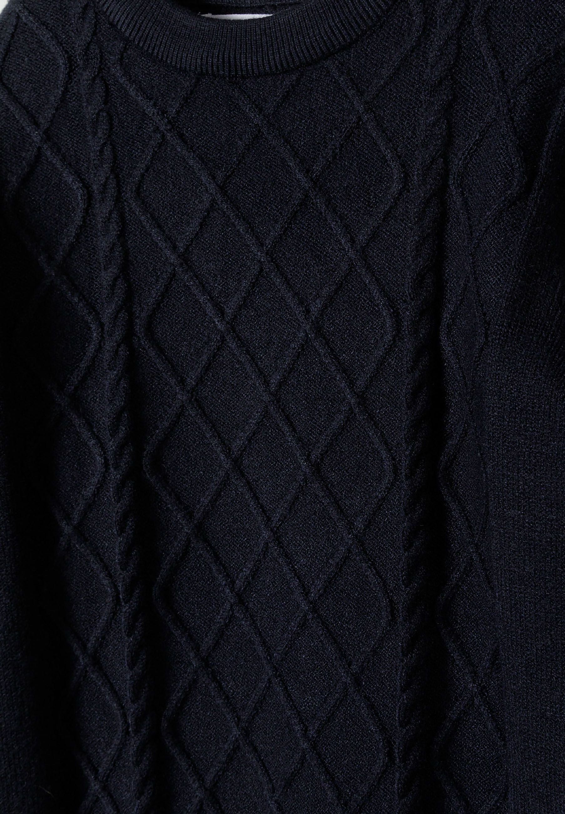 Boys cable knit sweater, navy, close-up, showcasing diamond texture and crew neck.
