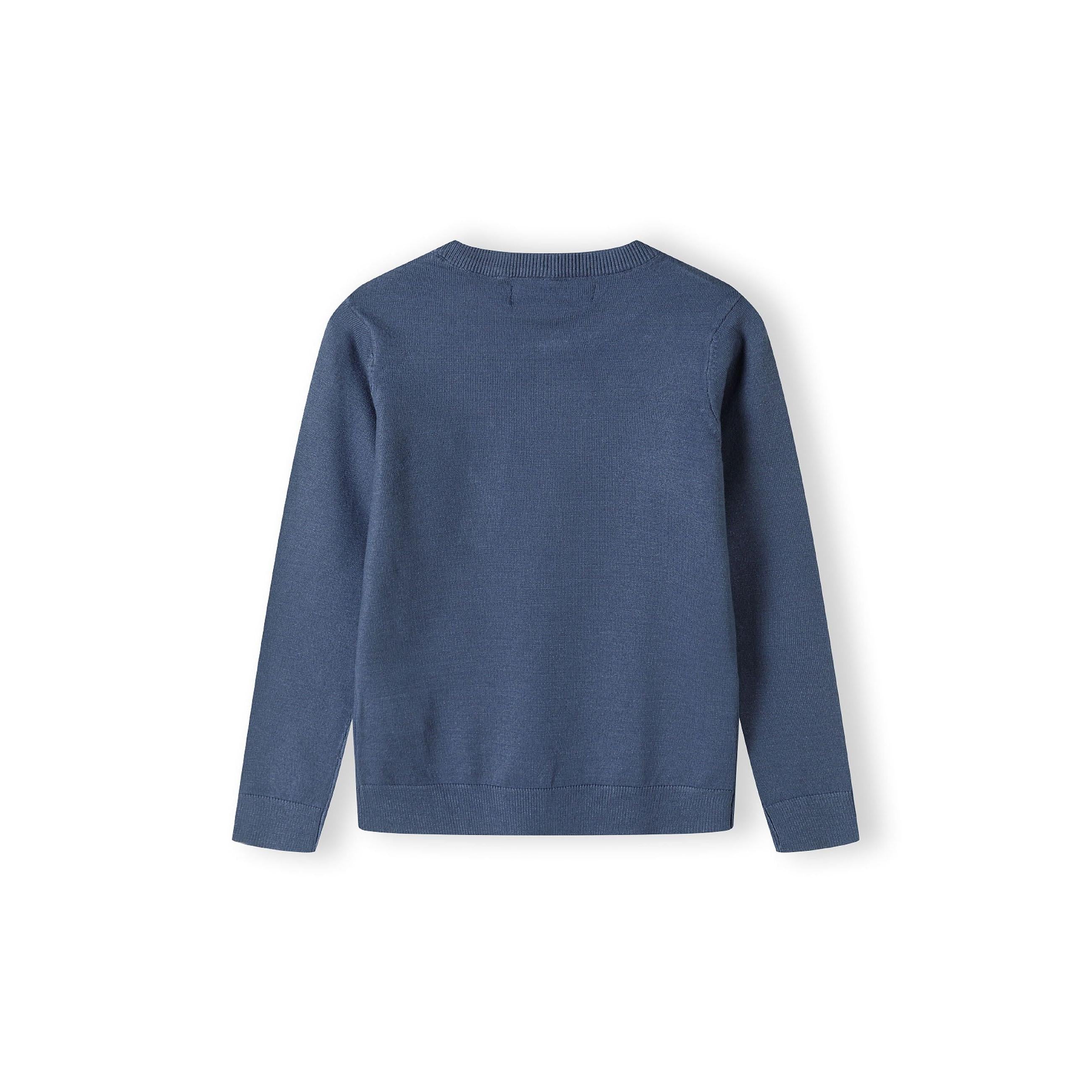 Back view of blue fine knit jumper showing plain design and ribbed hem detail on white background