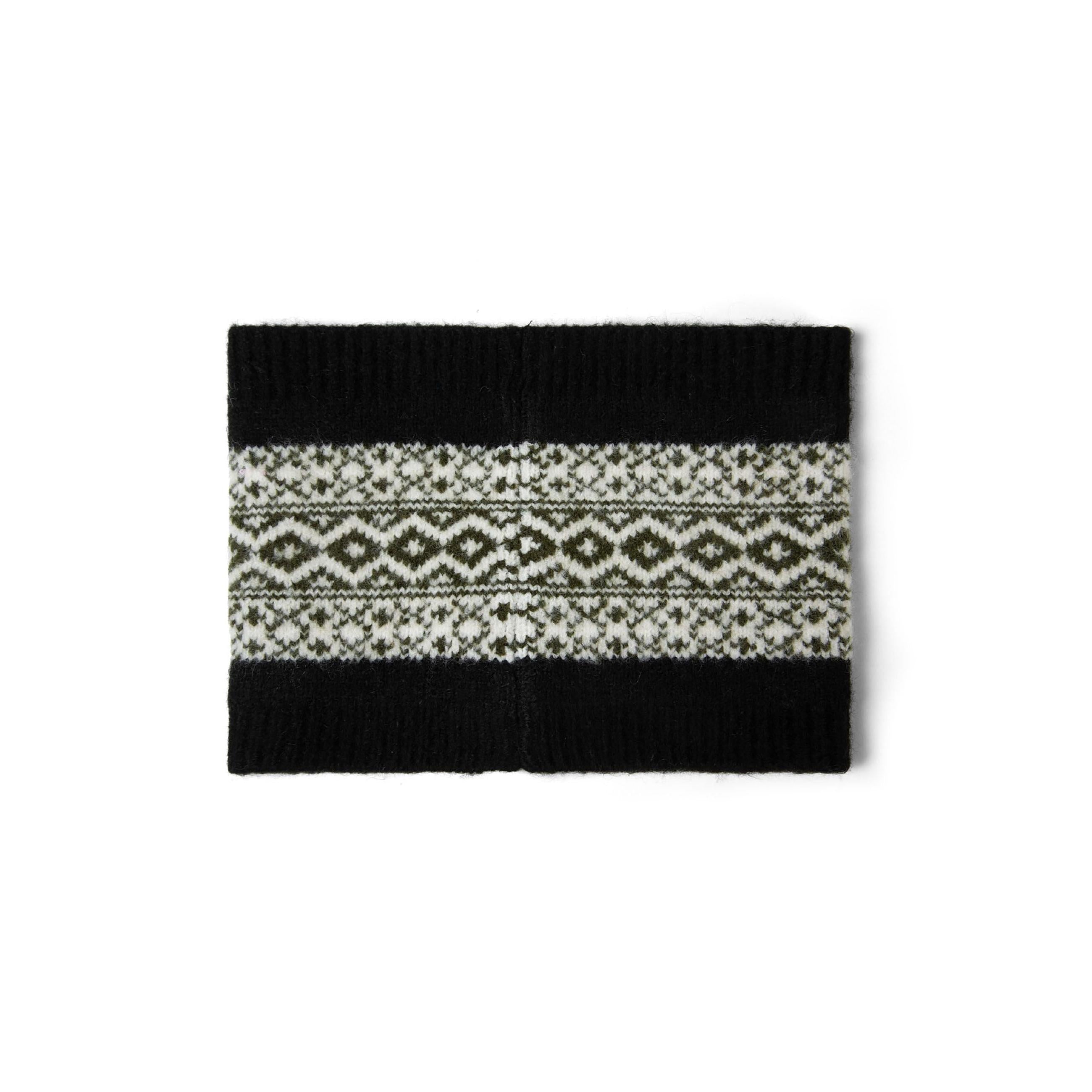 Snood shown in circular tube shape displaying the fair isle knit pattern with black interior lining visible