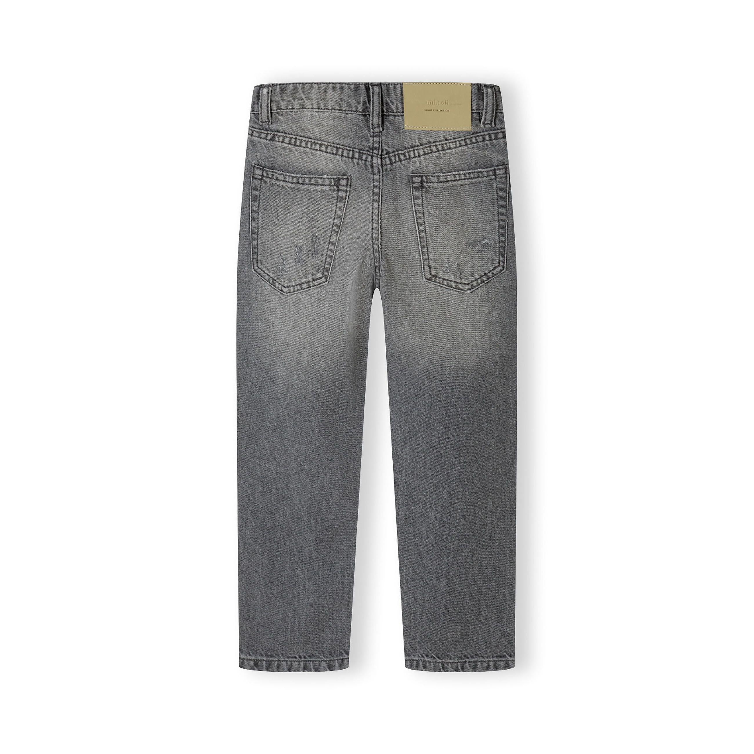 Back view of grey denim jeans showing classic five-pocket construction with tan leather waistband label, laid flat against white background