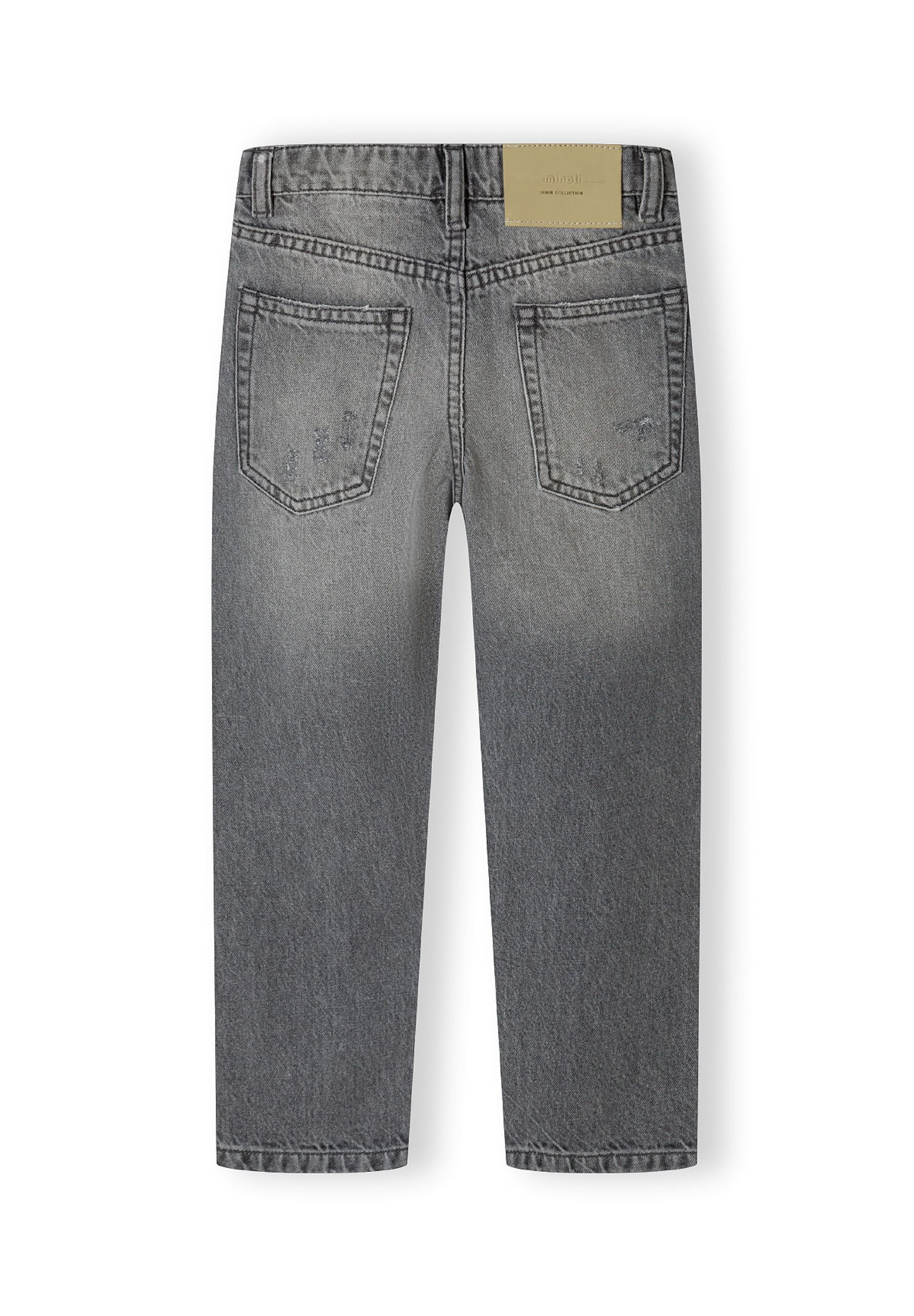 Boys grey denim jeans, back view, featuring rip-and-repair detailing and two back pockets.