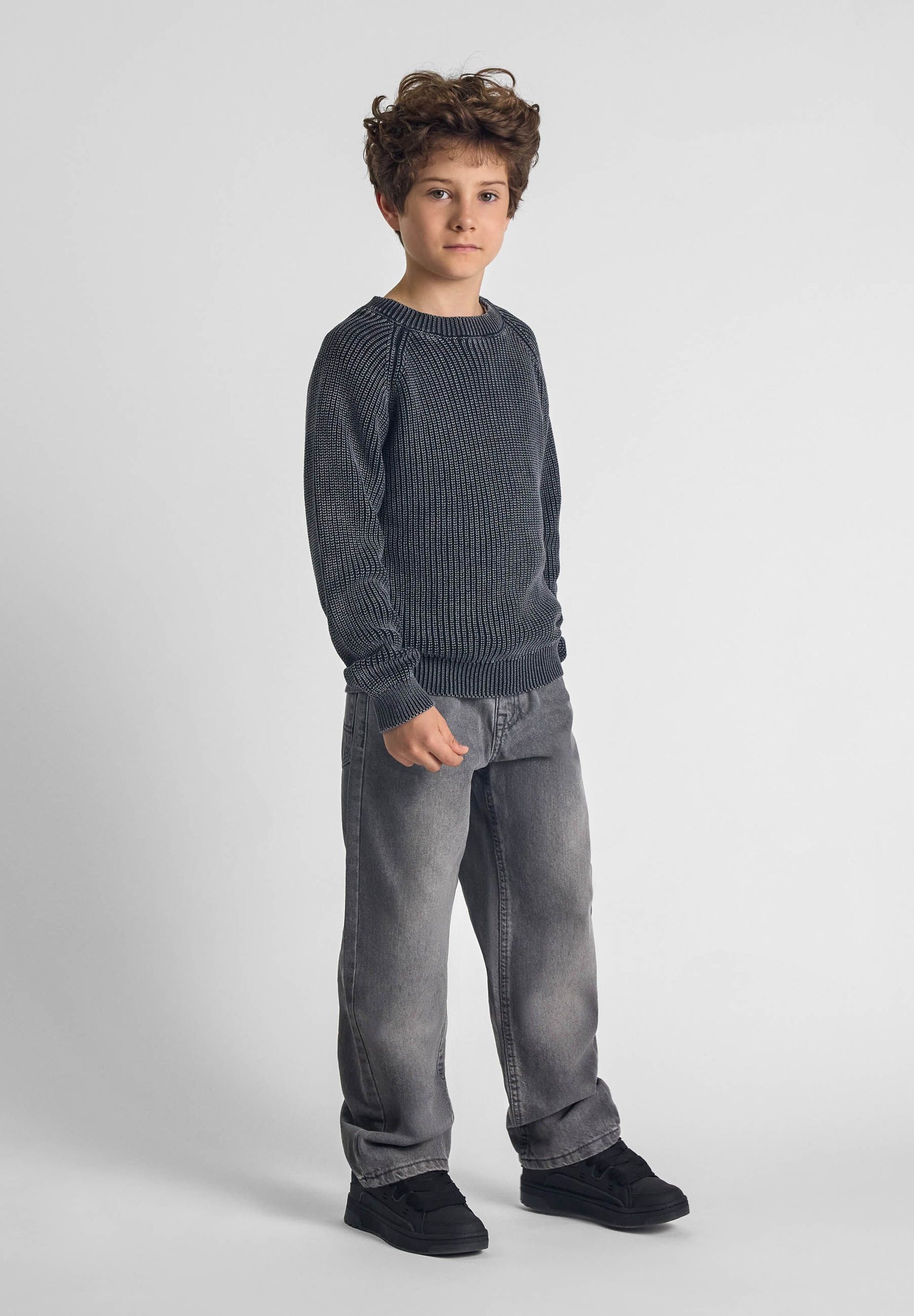 Boys baggy fit grey denim jeans, front view with five pockets.