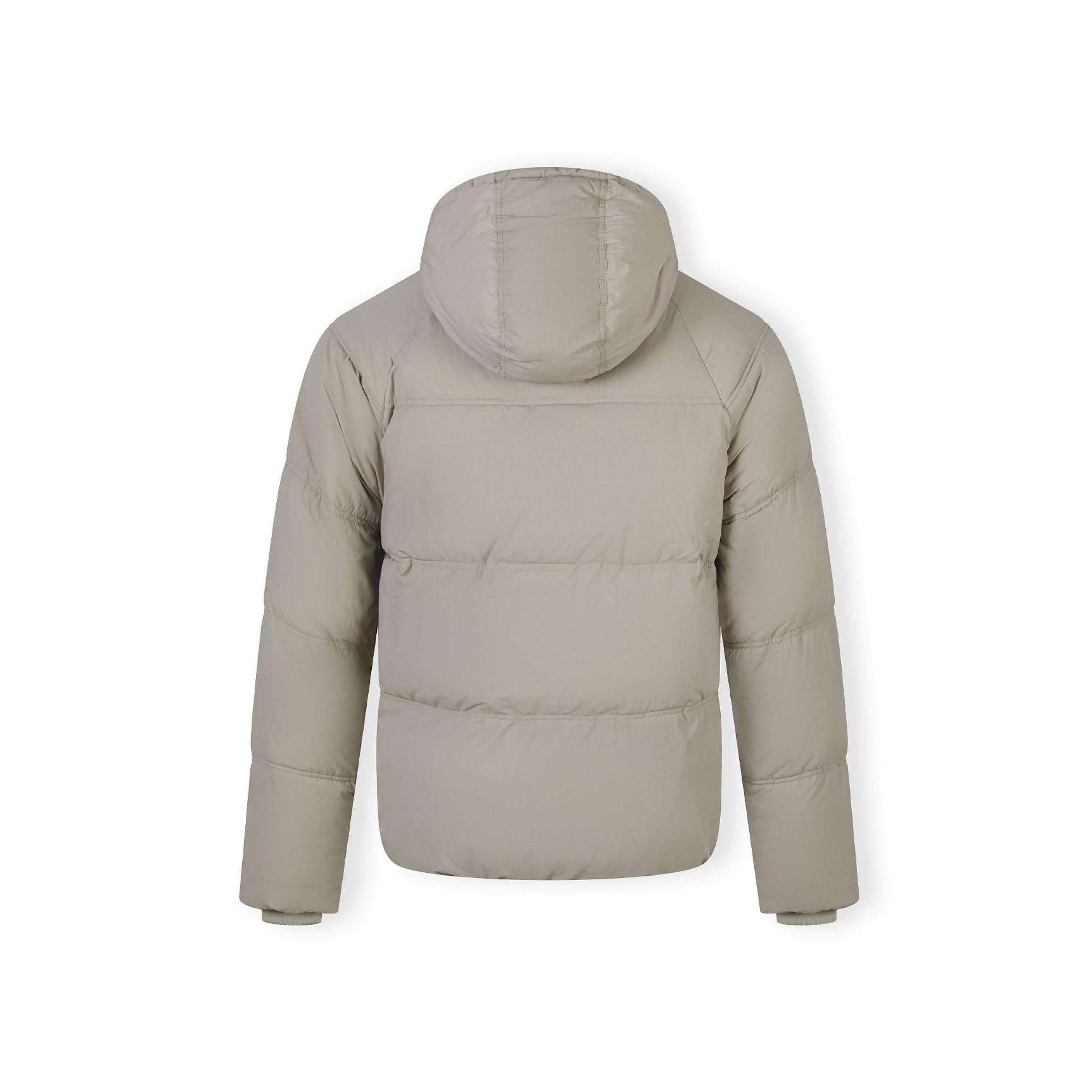 Close-up detail of grey quilted fabric showing black rectangular RESPECT logo patch with white text on jacket arm