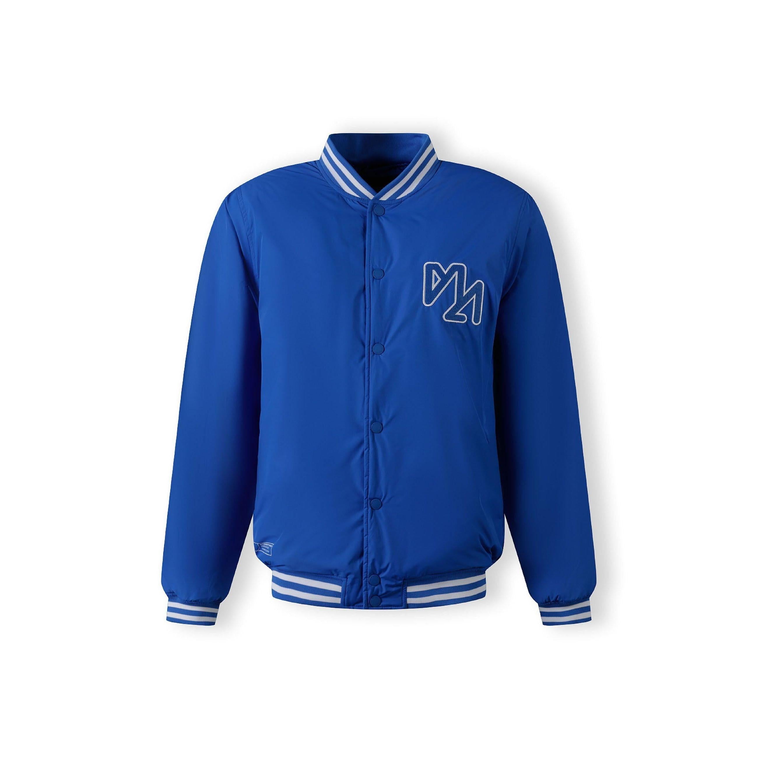 Cobalt blue bomber jacket laid flat showing baseball collar, white striped ribbed cuffs and hem, front zip closure on white background