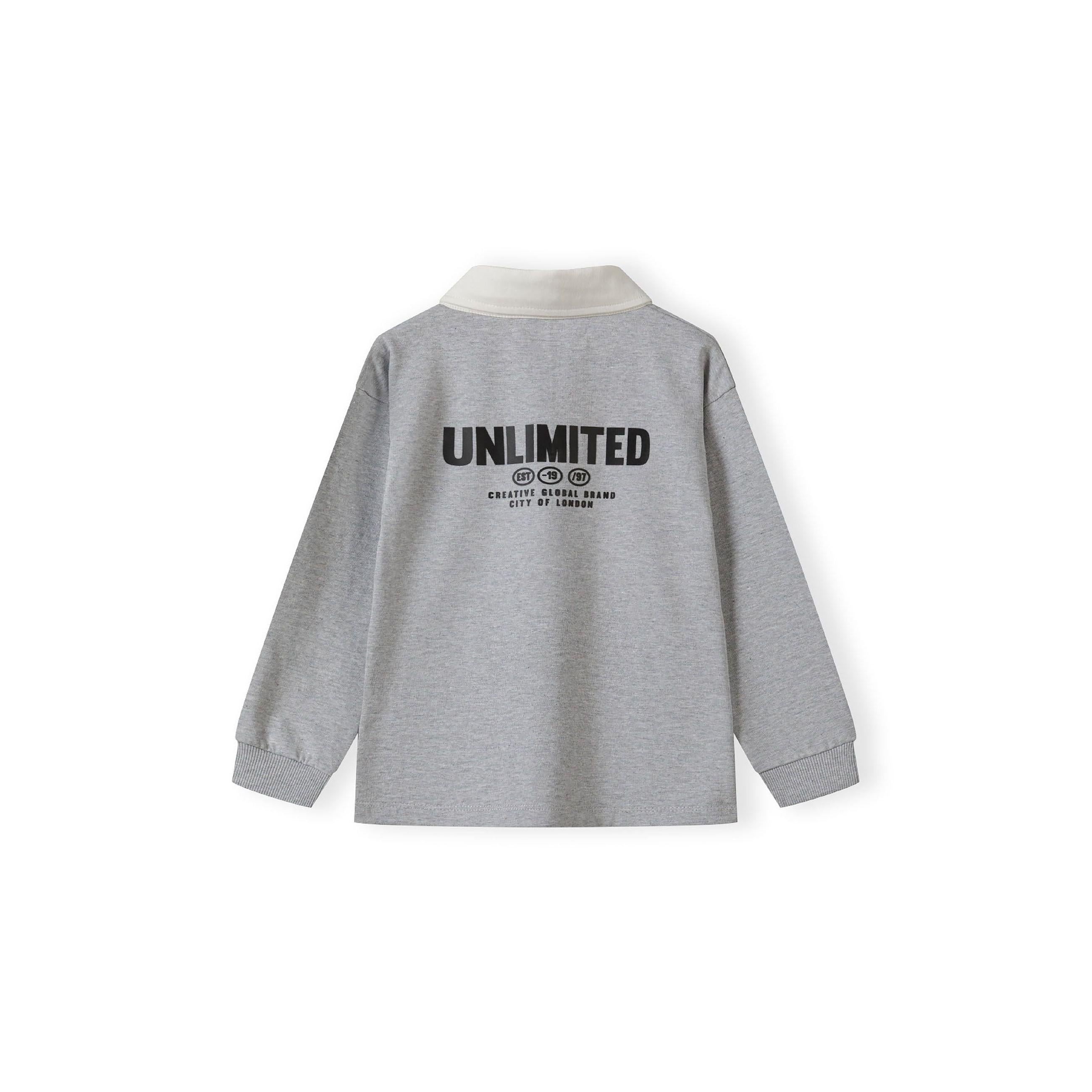 Back view of grey long sleeve polo shirt showing large UNLIMITED print with icons and text, displayed flat against white background