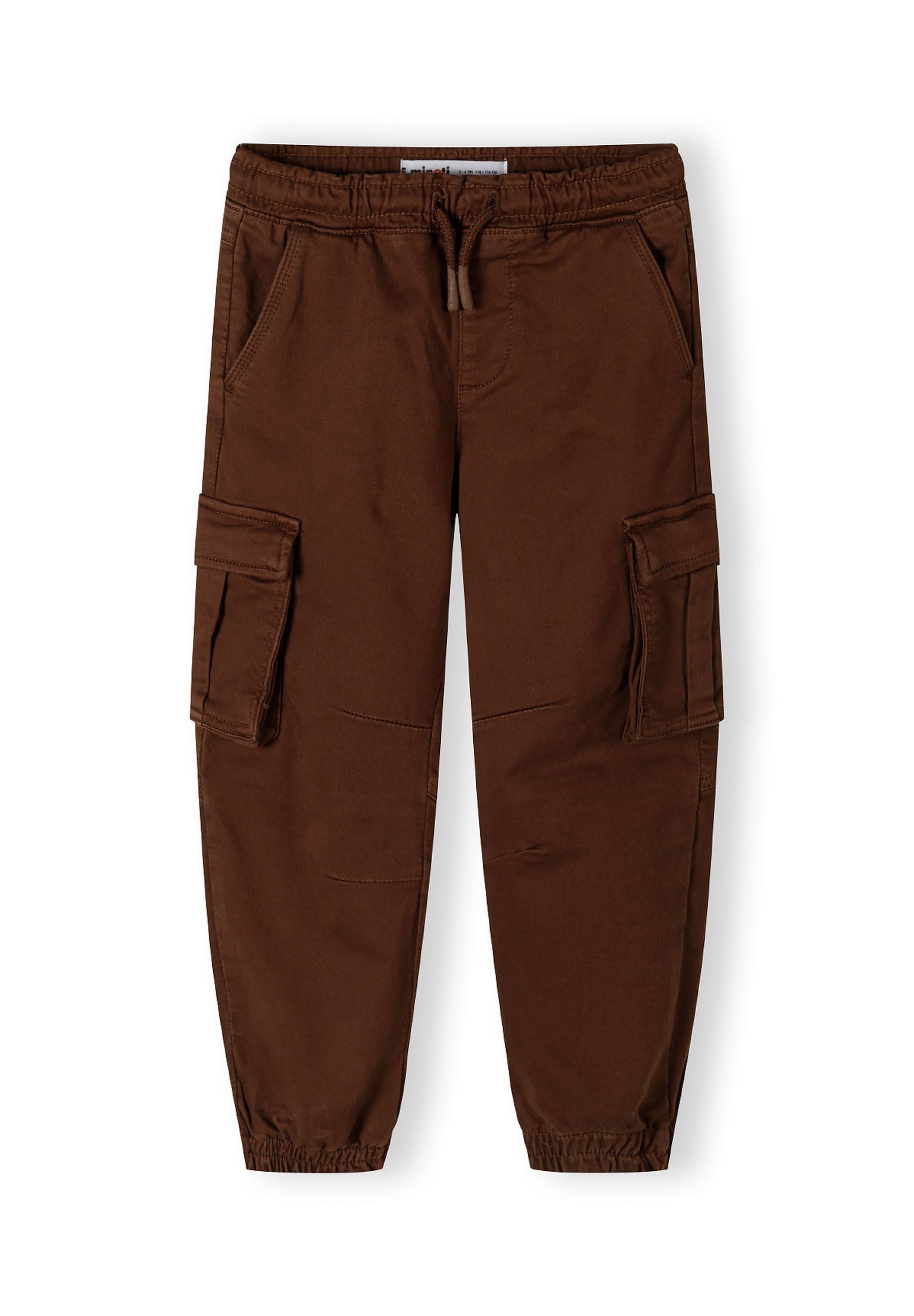 Boys cargo trousers in brown, front view with elasticated waistband and cargo pockets.
