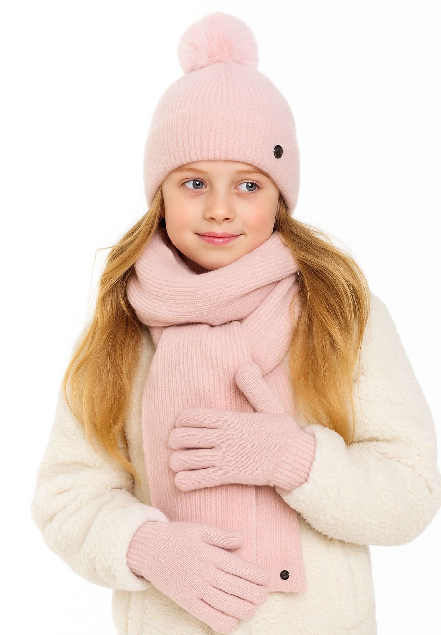 Girls 3-piece winter set including a ribbed knit hat with pompom, matching scarf, and gloves, close-up.