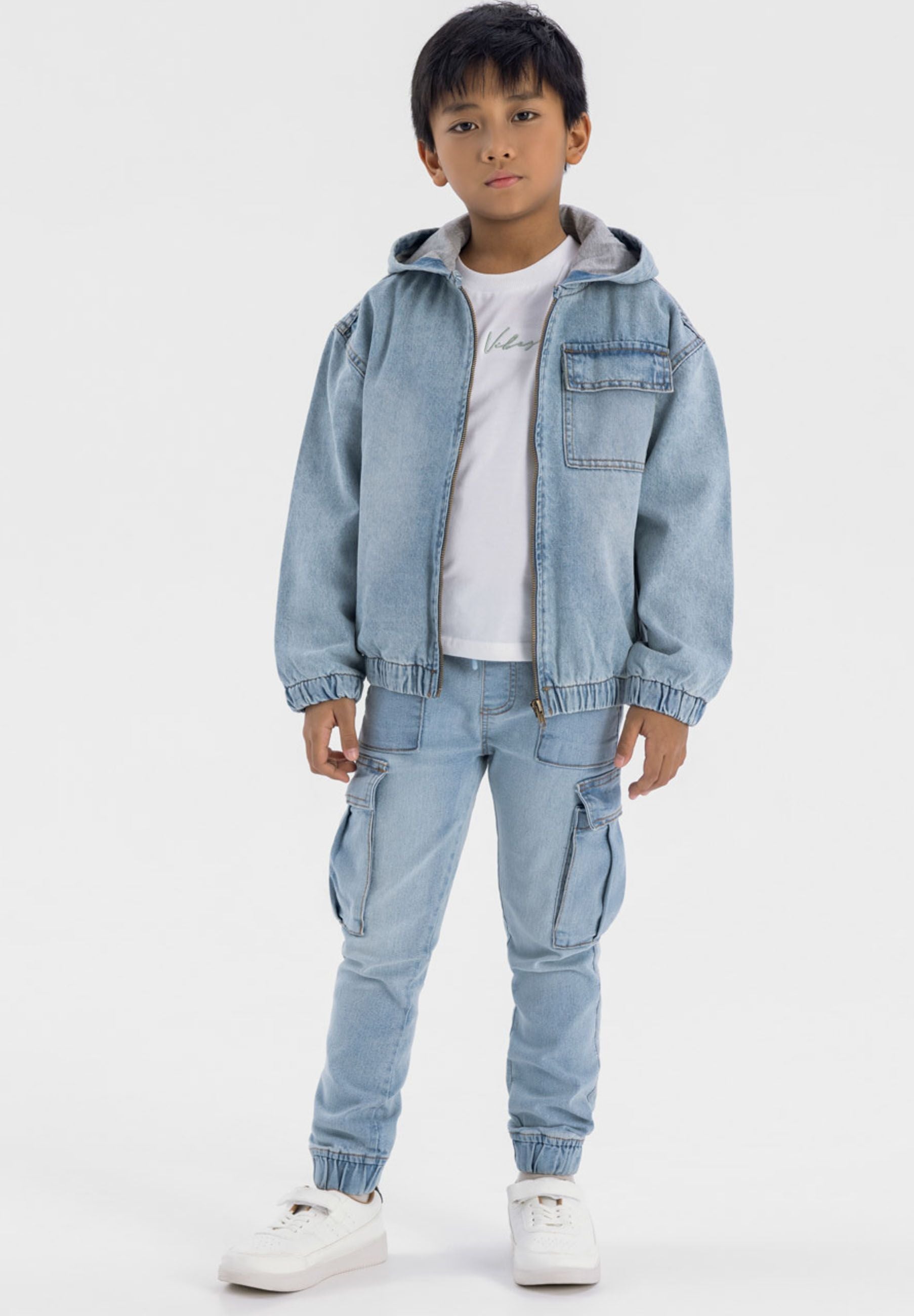 Boys light blue denim jacket with hood, front zip, and two pockets.