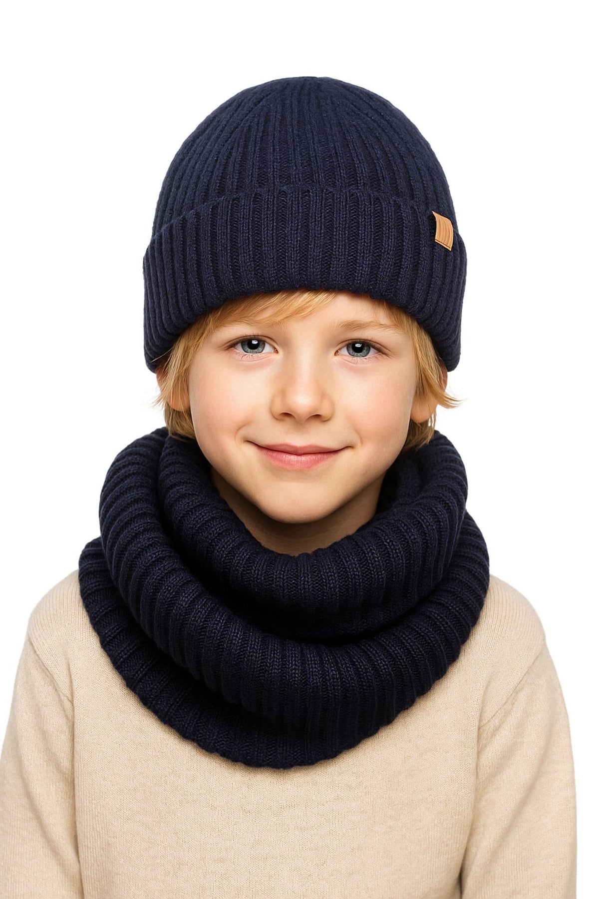 Boy wearing navy ribbed beanie with tan patch and matching chunky snood.