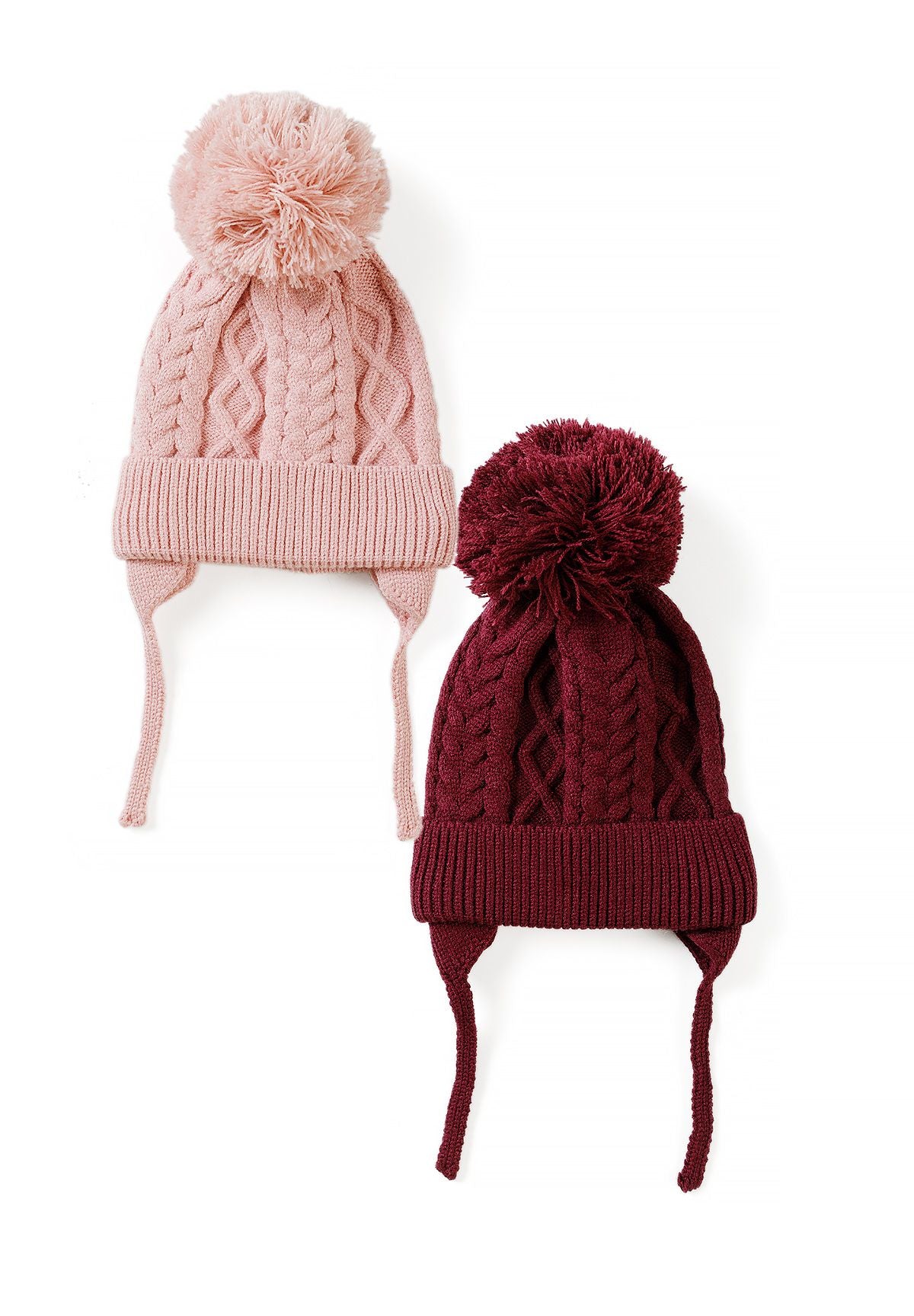 Pink and burgundy baby cable-knit hats with pom-poms, folded brims and tied earflaps, 2-pack.