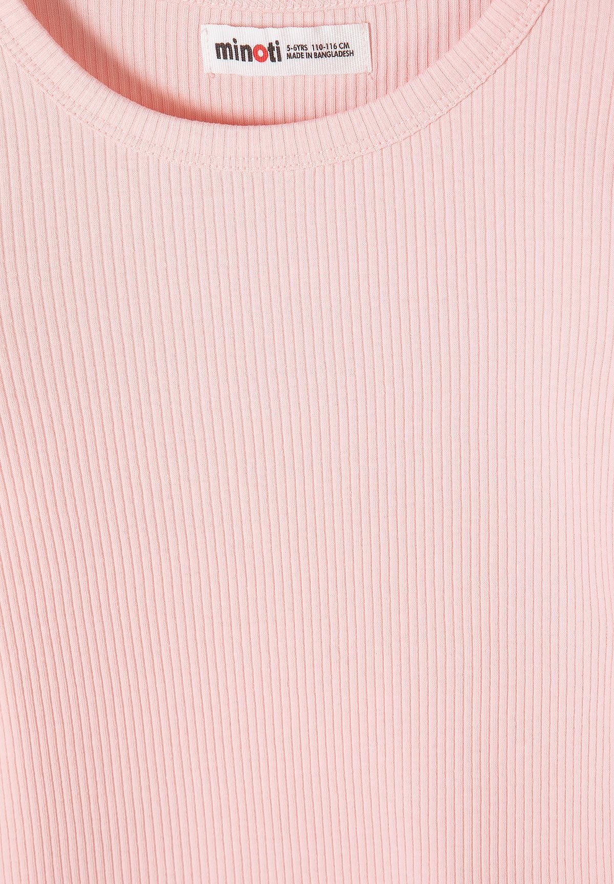Close-up of pale-pink vertical rib fabric and round dress neckline.